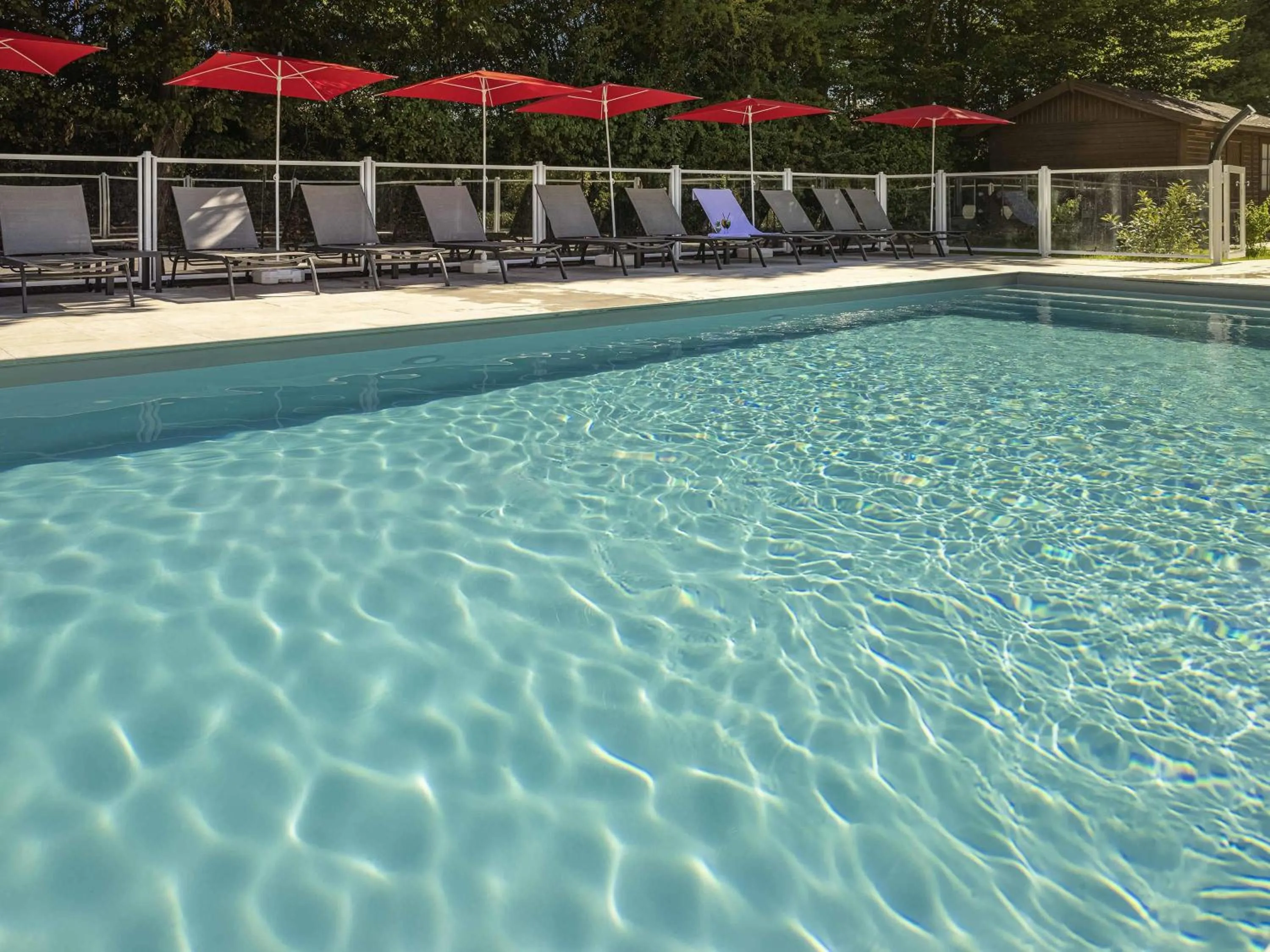 Pool view in ibis Lyon Nord