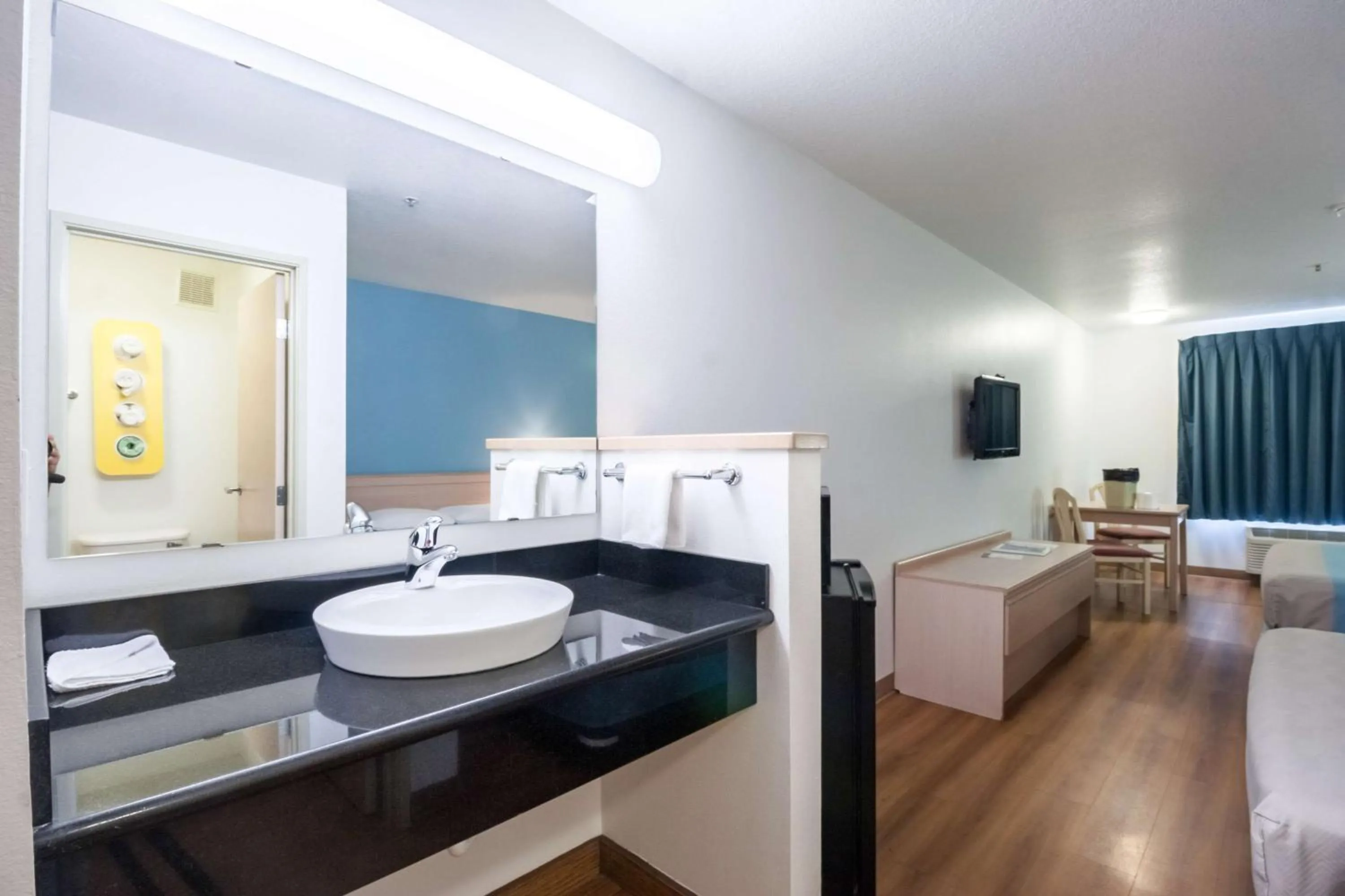 Bathroom, Bed in Motel 6-Seaside, OR