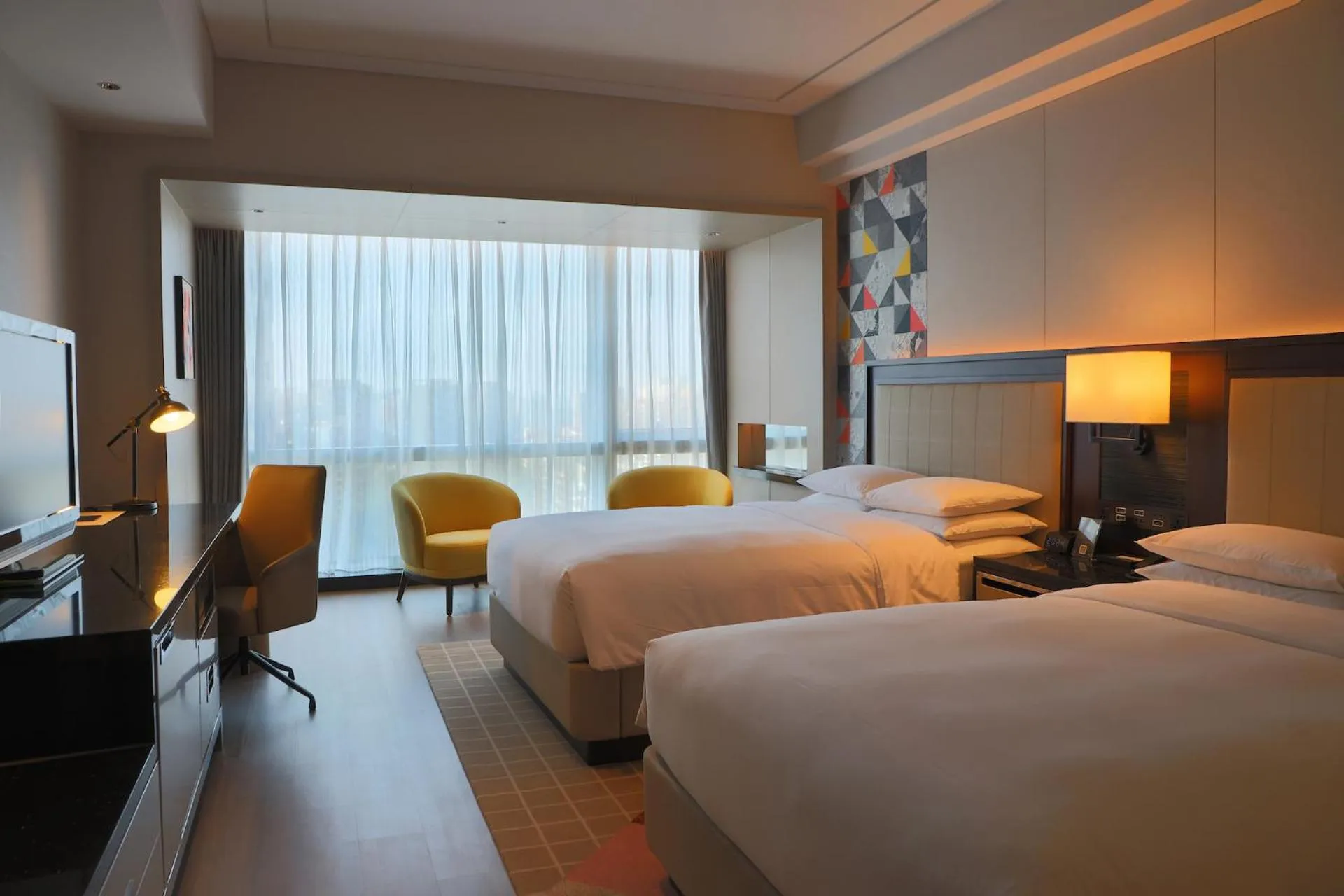 Bed in Renaissance Beijing Capital Hotel