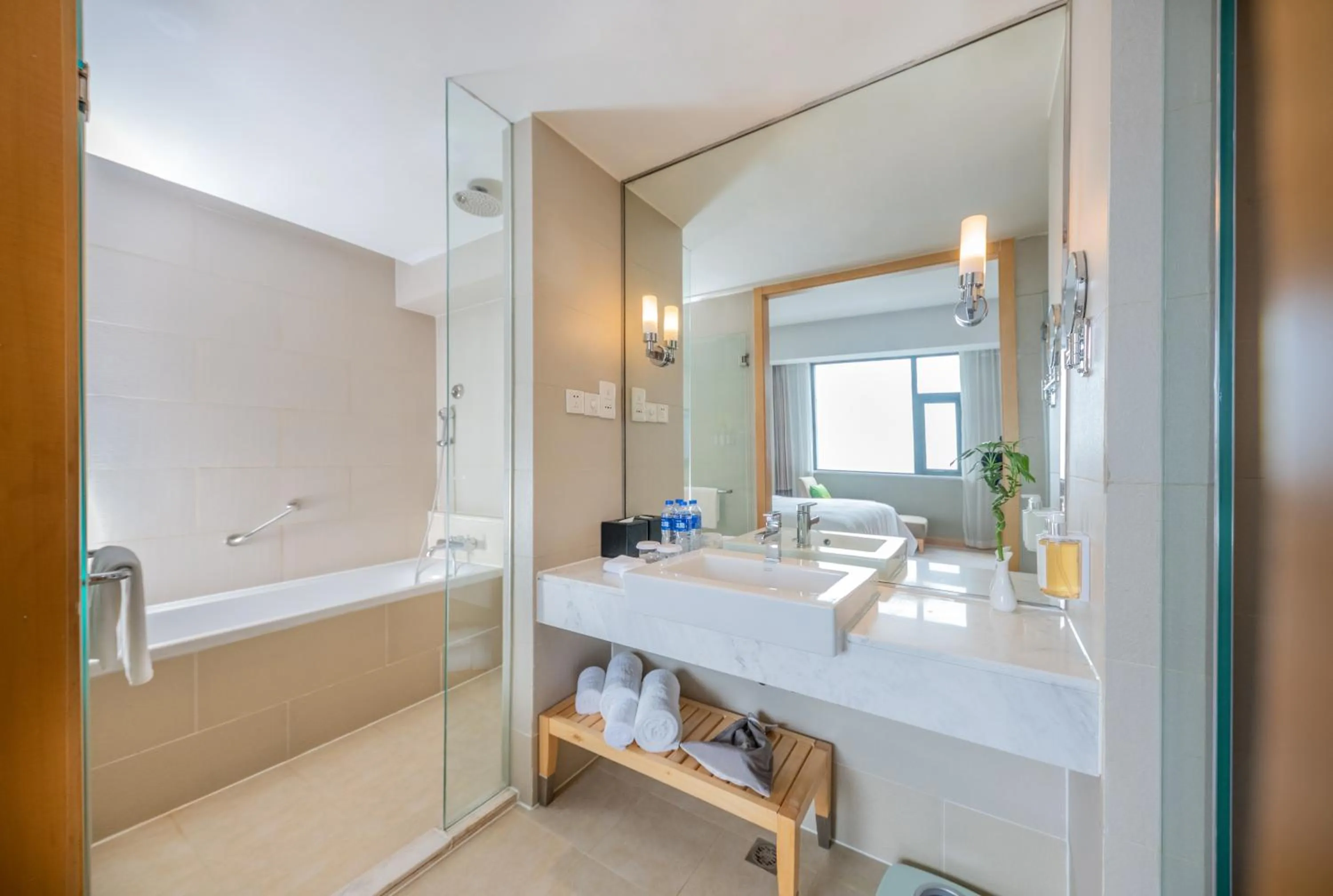 Bathroom in Holiday Inn Beijing Deshengmen by IHG on 2nd Ring Road Extension 10-15 minute taxi ride to Shichahai Lama Temple Drum Tower Close to Beijing North Station for Badaling Great Wall Near Exit B Jishuitan Metro Line 2