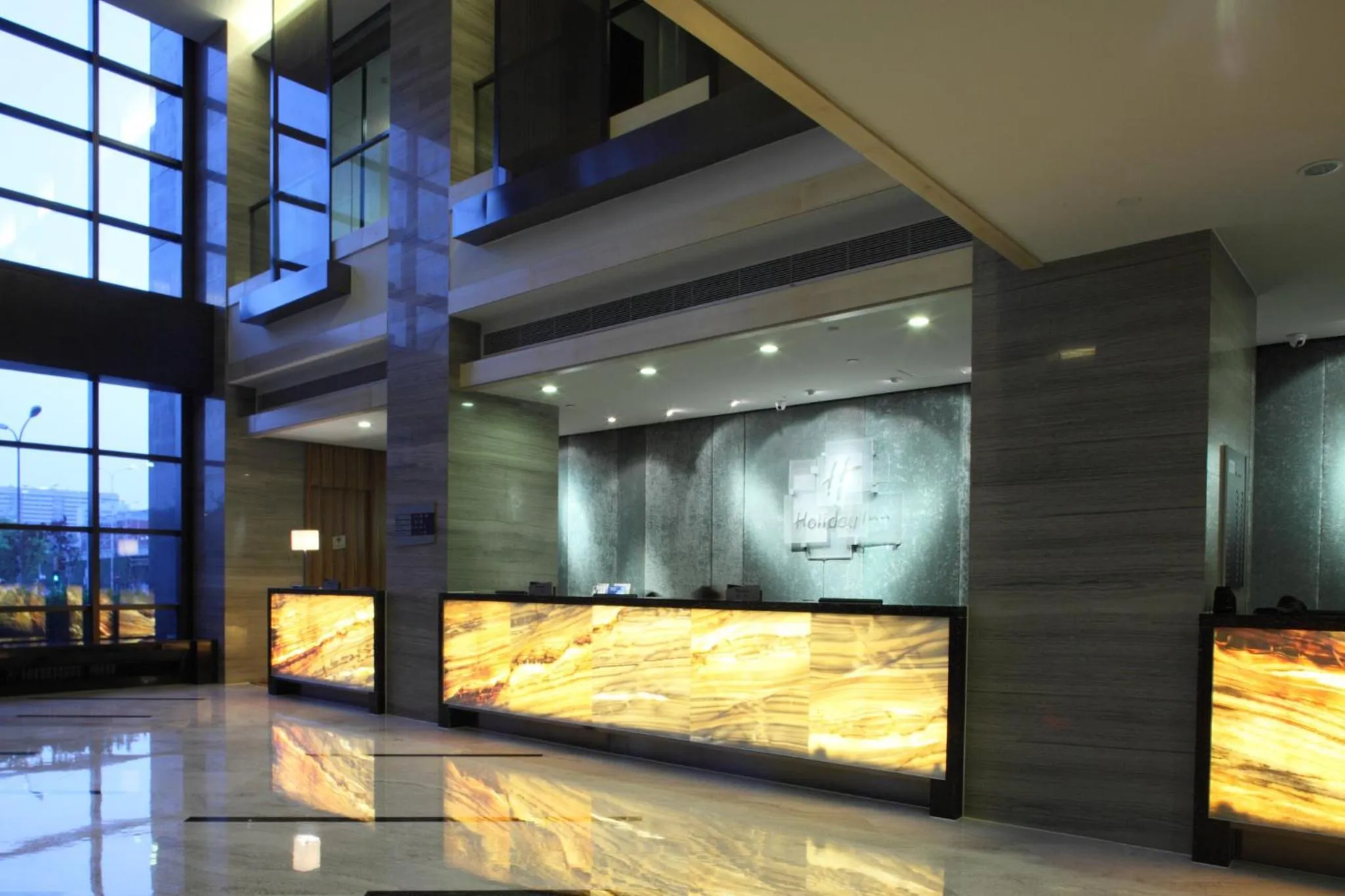 Property building in Holiday Inn Beijing Deshengmen by IHG on 2nd Ring Road Extension 10-15 minute taxi ride to Shichahai Lama Temple Drum Tower Close to Beijing North Station for Badaling Great Wall Near Exit B Jishuitan Metro Line 2