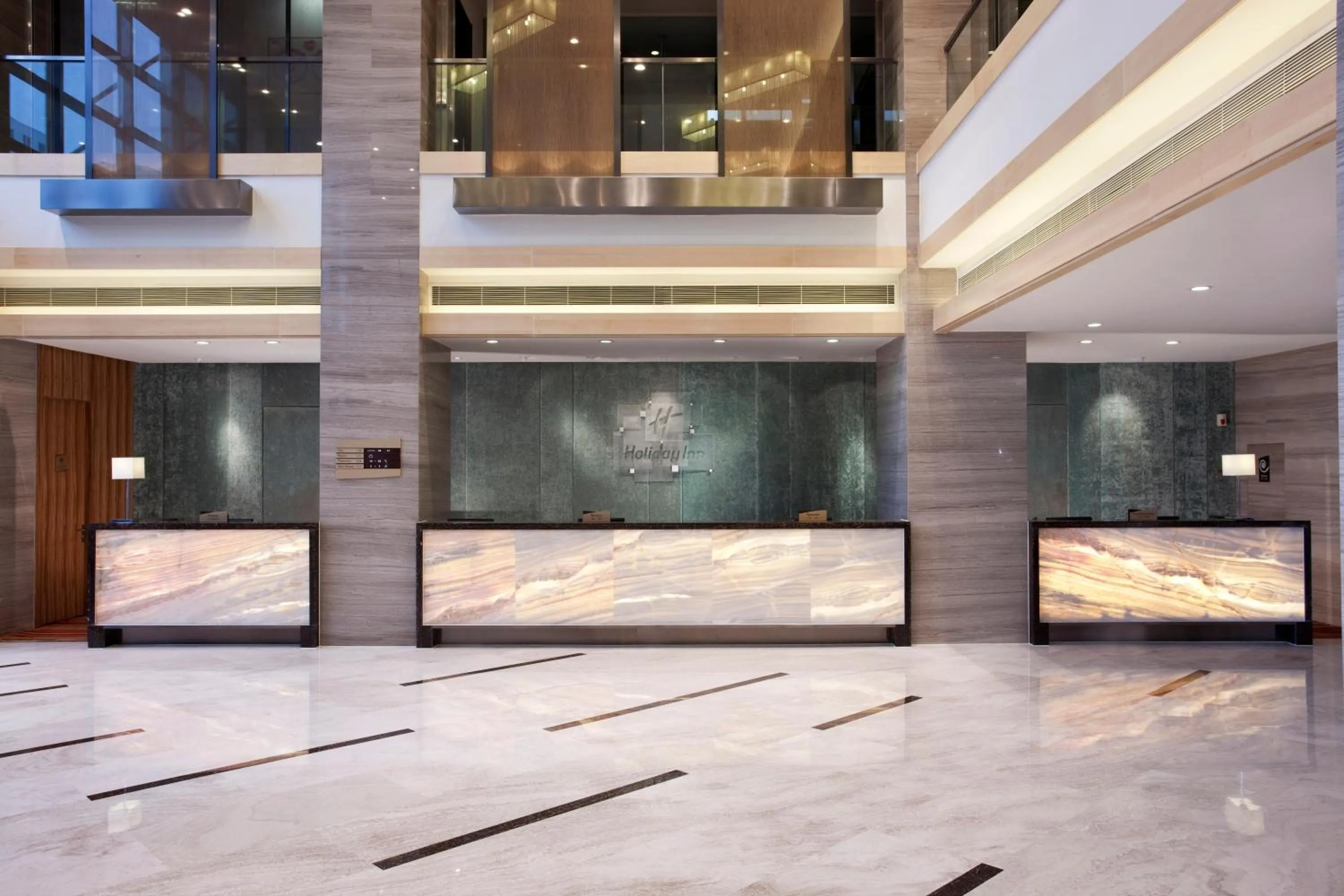 Property building in Holiday Inn Beijing Deshengmen by IHG on 2nd Ring Road Extension 10-15 minute taxi ride to Shichahai Lama Temple Drum Tower Close to Beijing North Station for Badaling Great Wall Near Exit B Jishuitan Metro Line 2