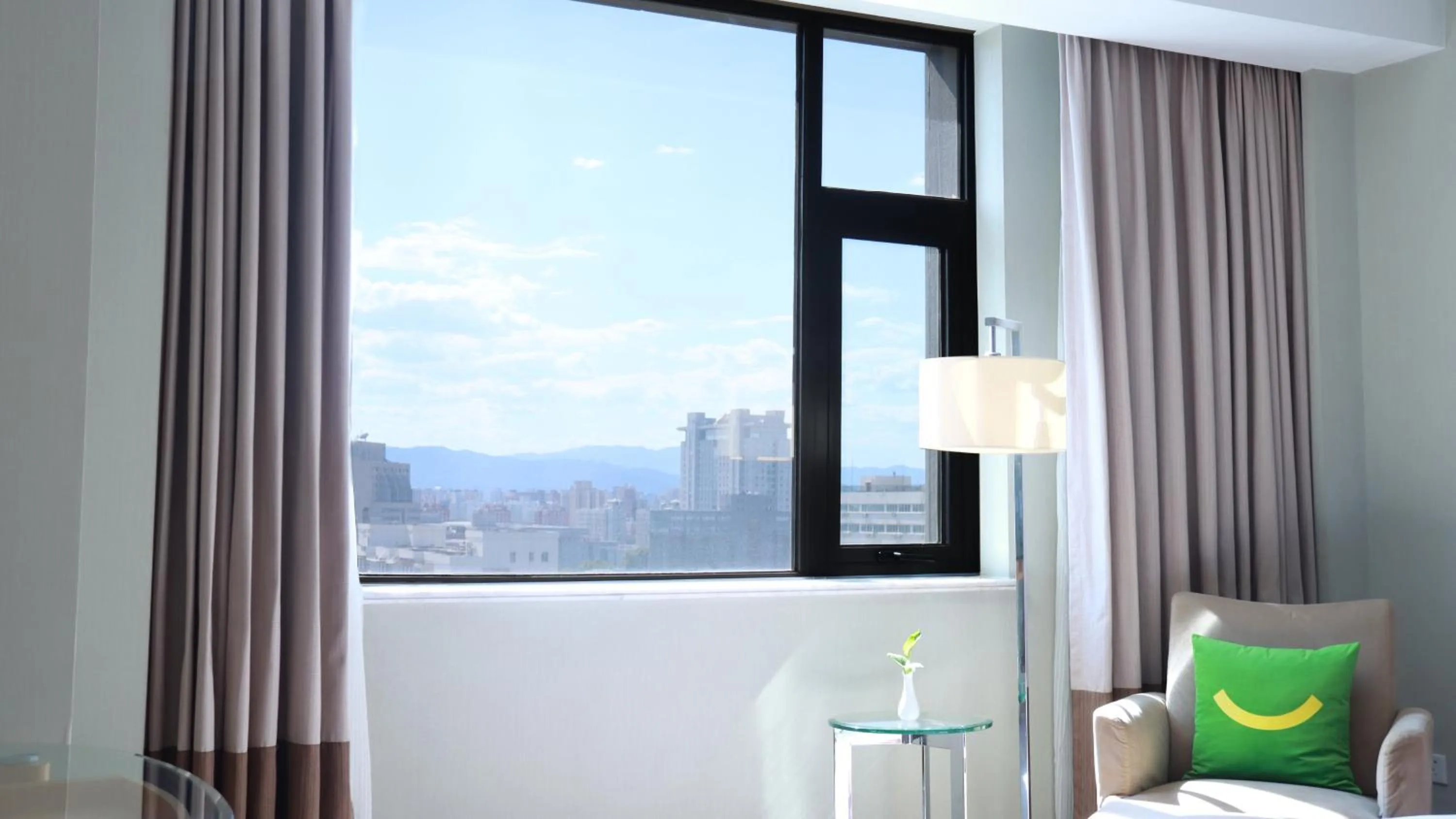 Photo of the whole room in Holiday Inn Beijing Deshengmen by IHG on 2nd Ring Road Extension 10-15 minute taxi ride to Shichahai Lama Temple Drum Tower Close to Beijing North Station for Badaling Great Wall Near Exit B Jishuitan Metro Line 2