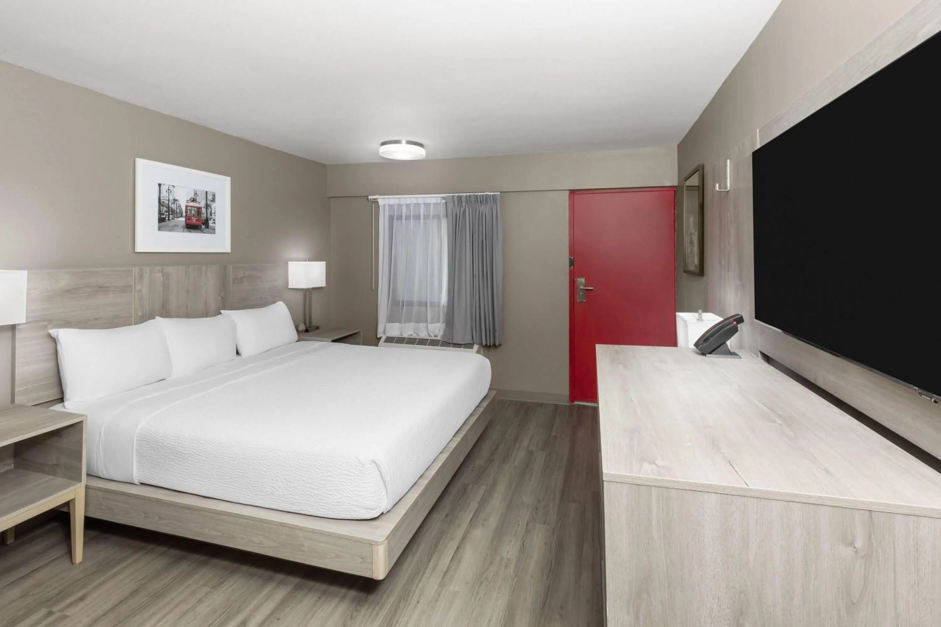 Photo of the whole room, Bed in Ramada by Wyndham Kenner New Orleans Airport South