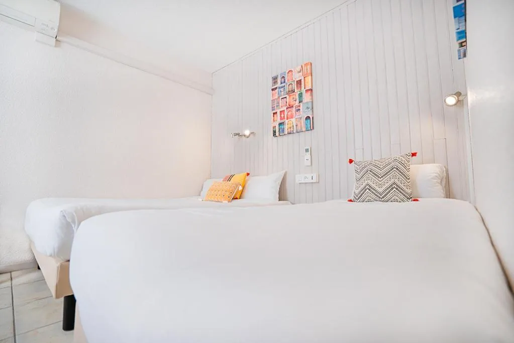 Bedroom, Bed in Logis Hôtel- Hôtel Restaurant Le Rialto