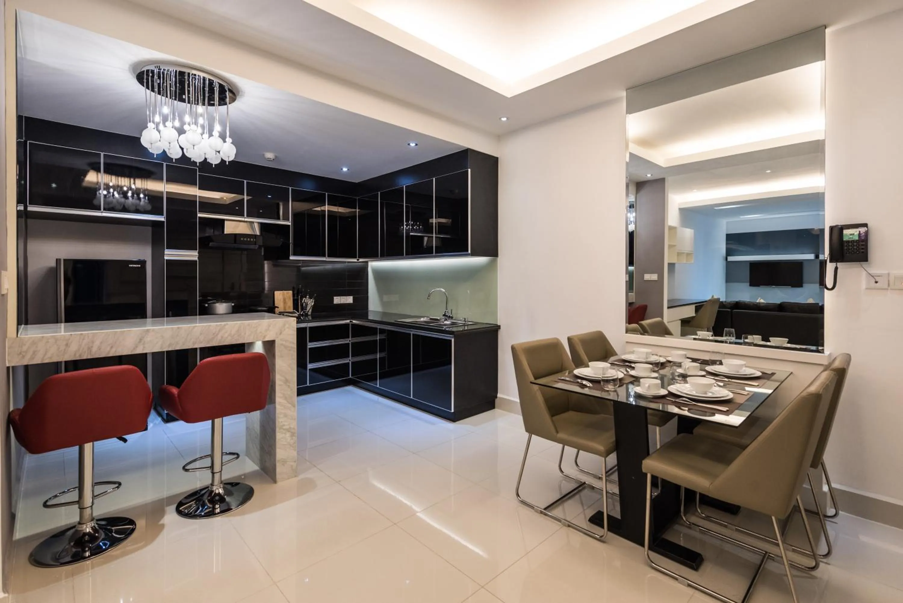 Kitchen or kitchenette in Naki Suites @ Silvertown