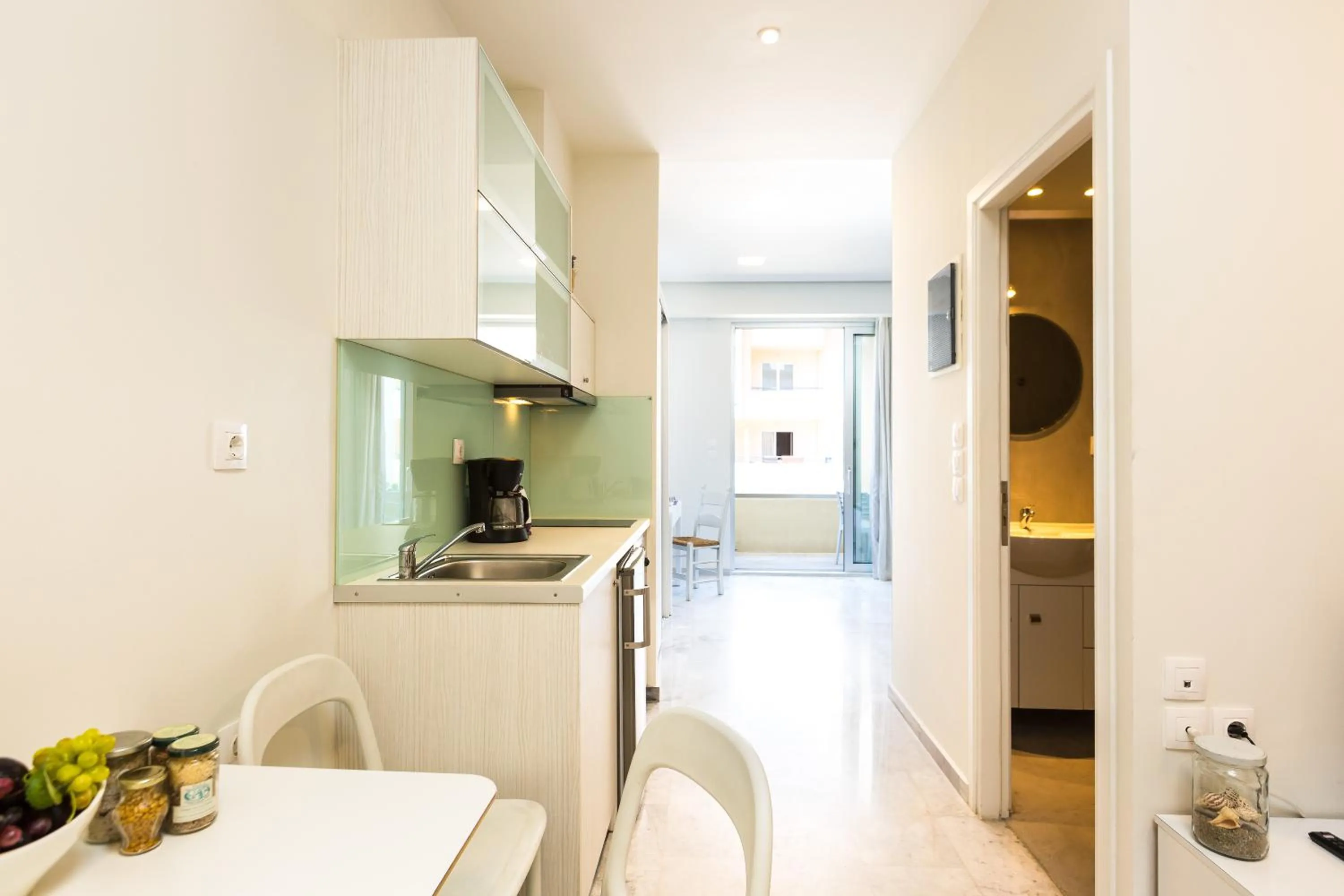 Kitchen or kitchenette in Meltemi Coast Suites