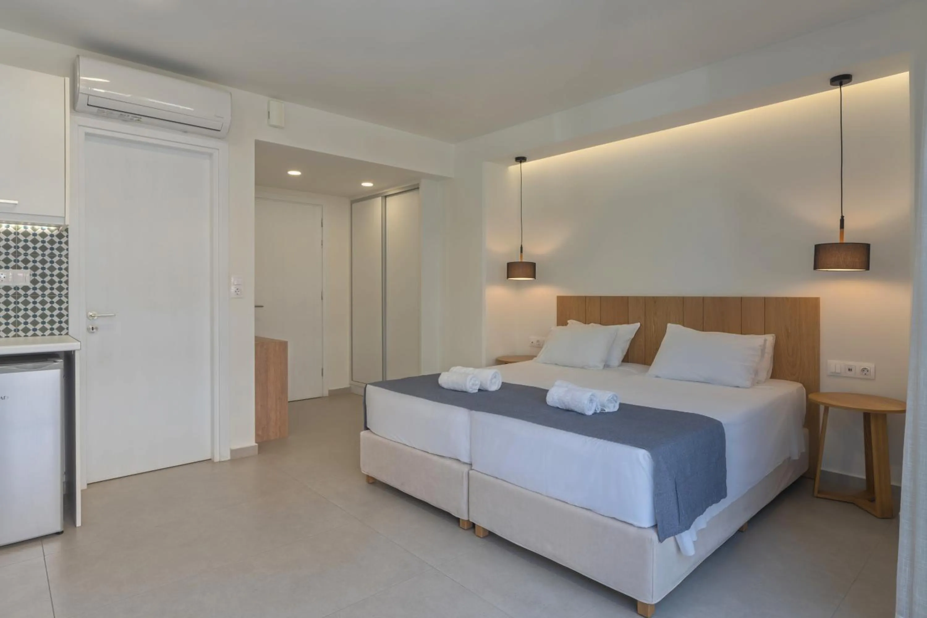 Bed in Meltemi Coast Suites