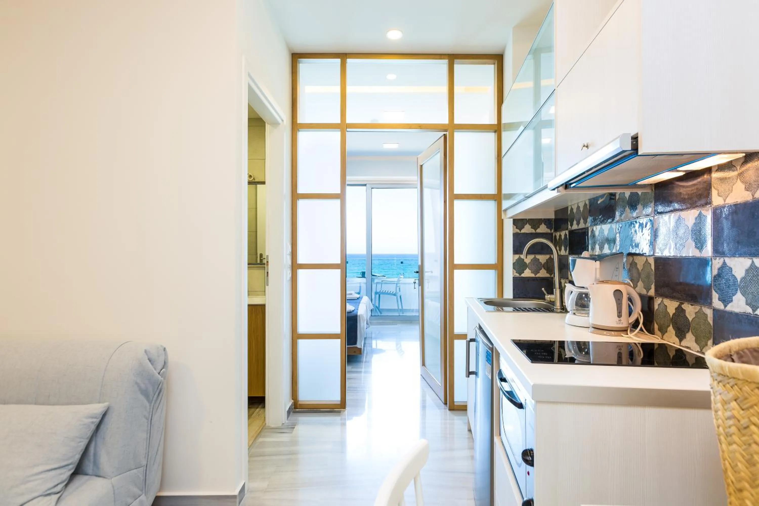 Communal kitchen in Meltemi Coast Suites