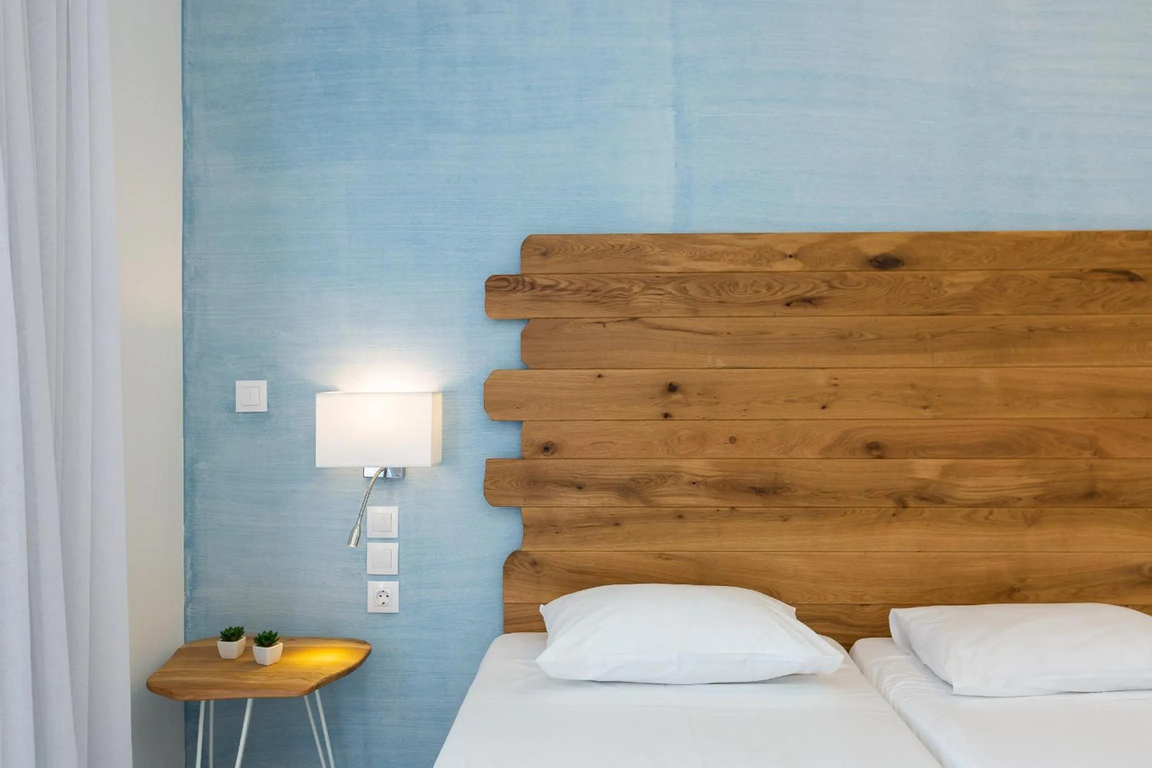 Decorative detail, Bed in Meltemi Coast Suites