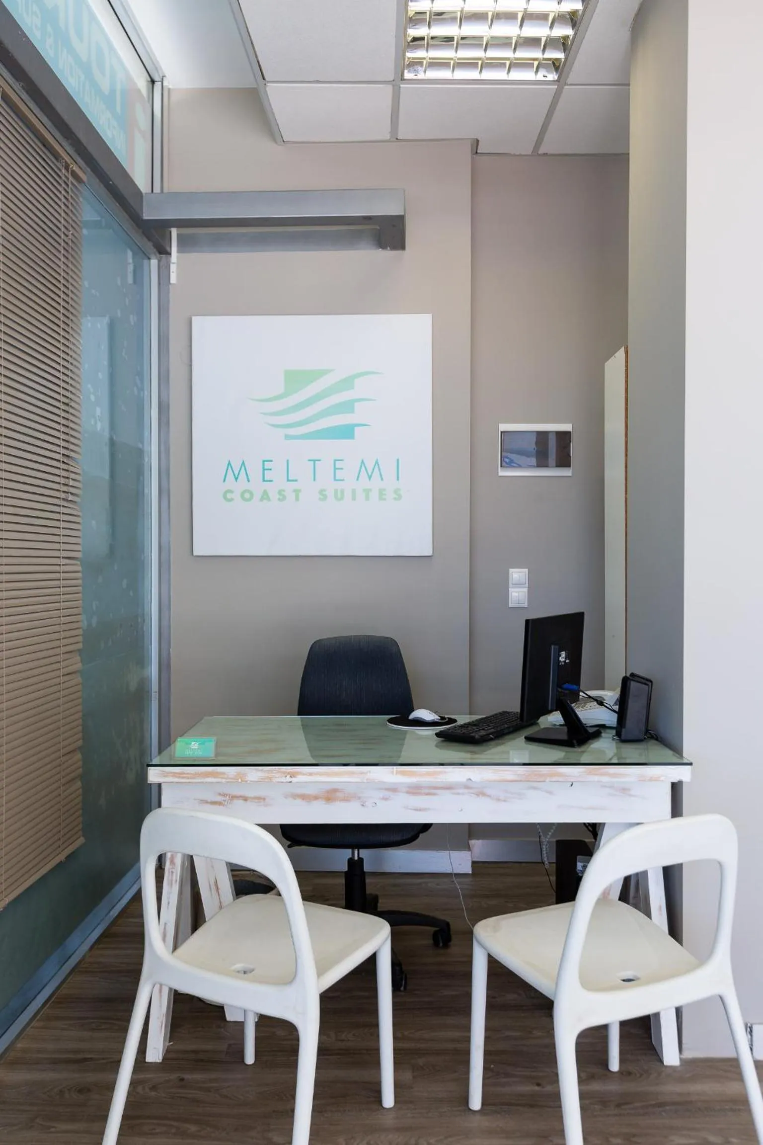 Property logo or sign in Meltemi Coast Suites