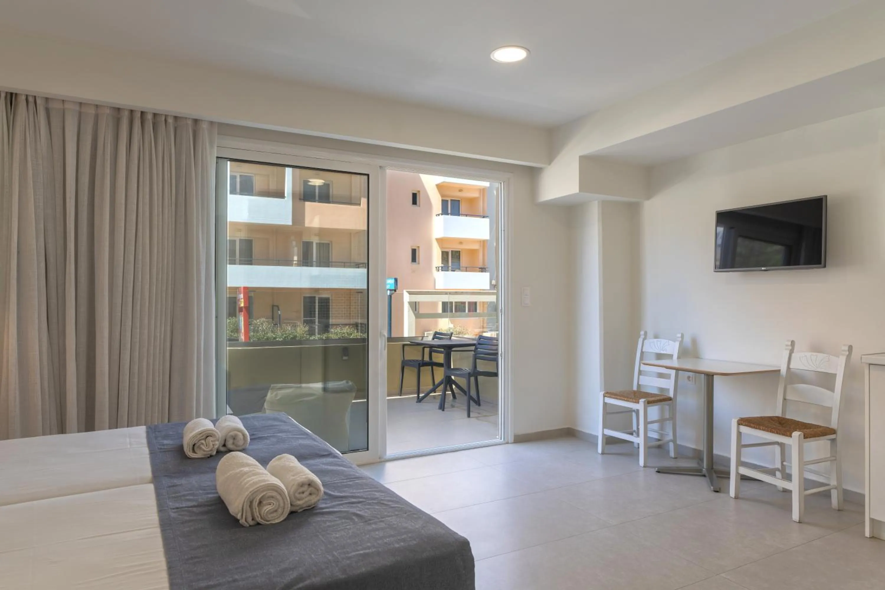 Bed in Meltemi Coast Suites