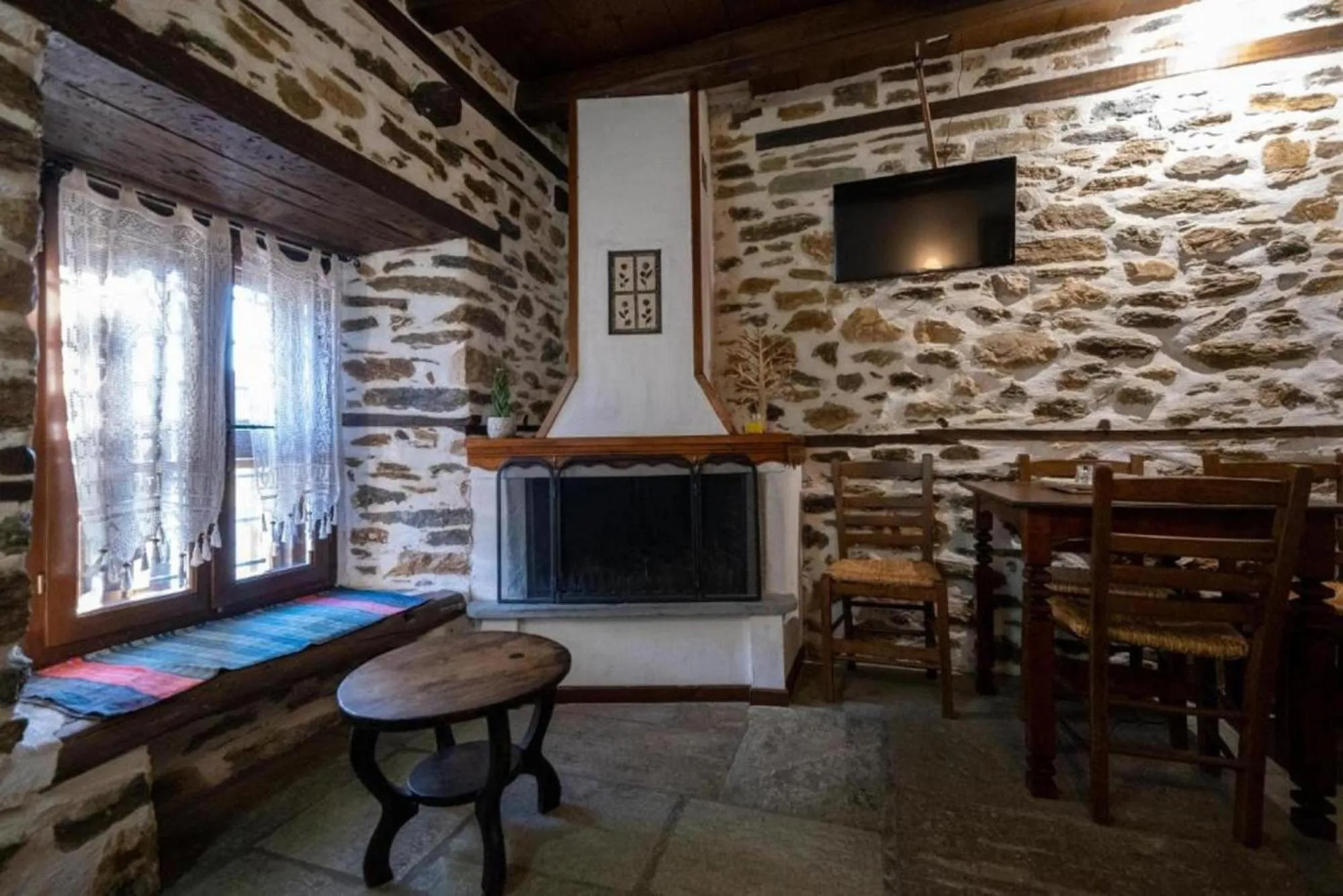 Communal lounge/ TV room in Archontiko Michael Pelion