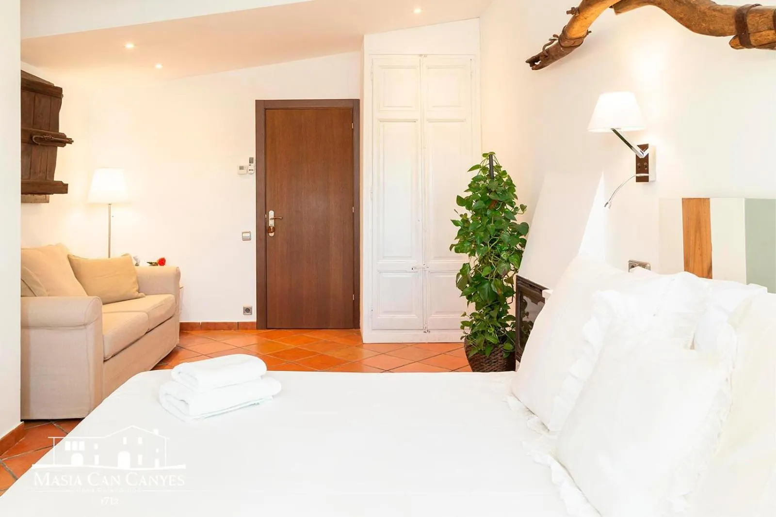 Bed in Masia Can Canyes & Spa
