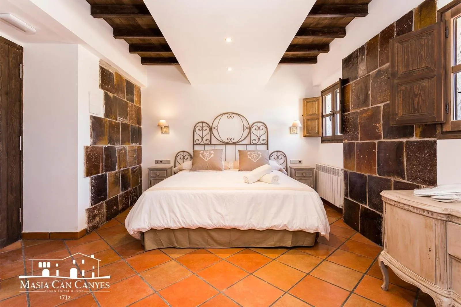 Bed in Masia Can Canyes & Spa