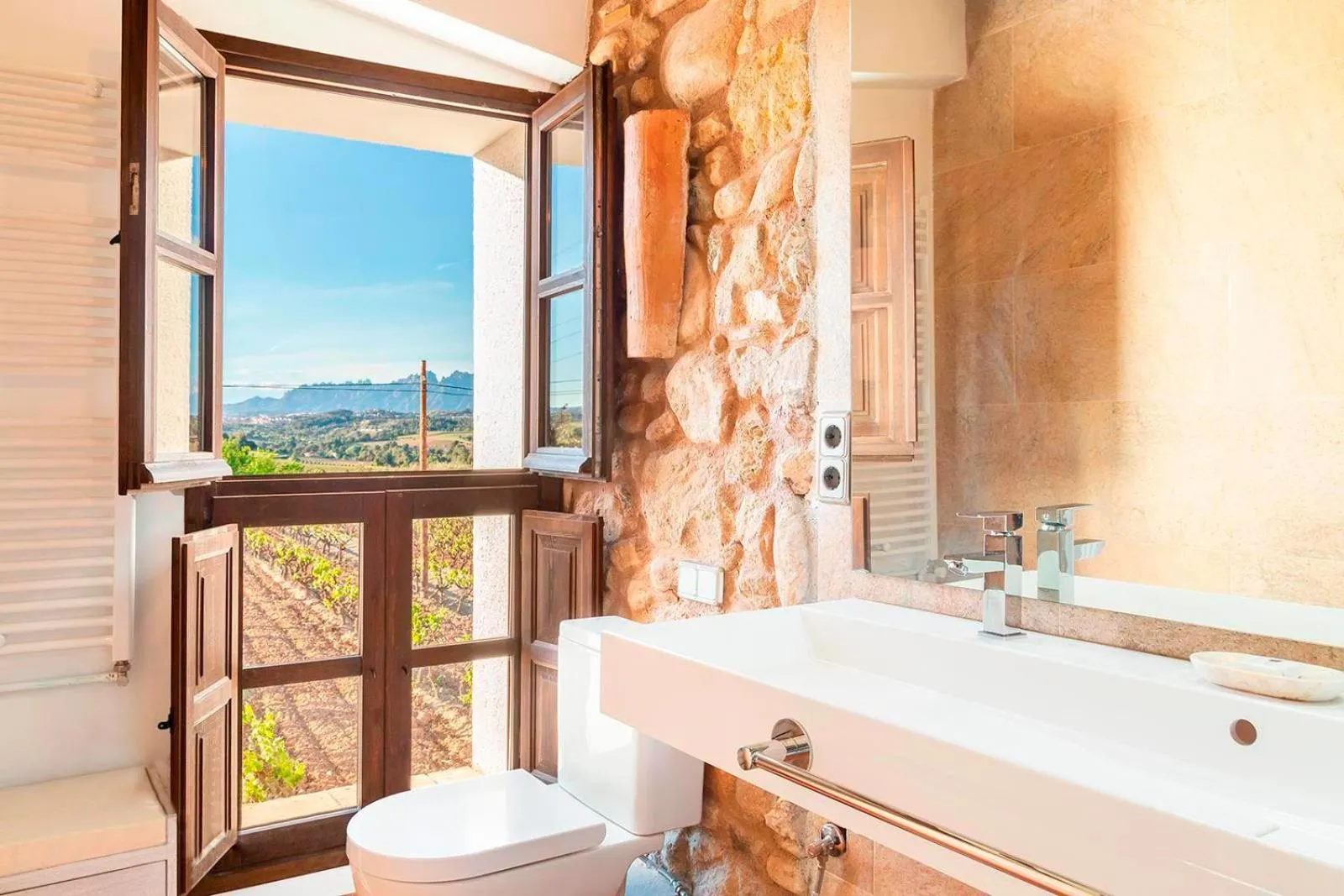 Bathroom in Masia Can Canyes & Spa