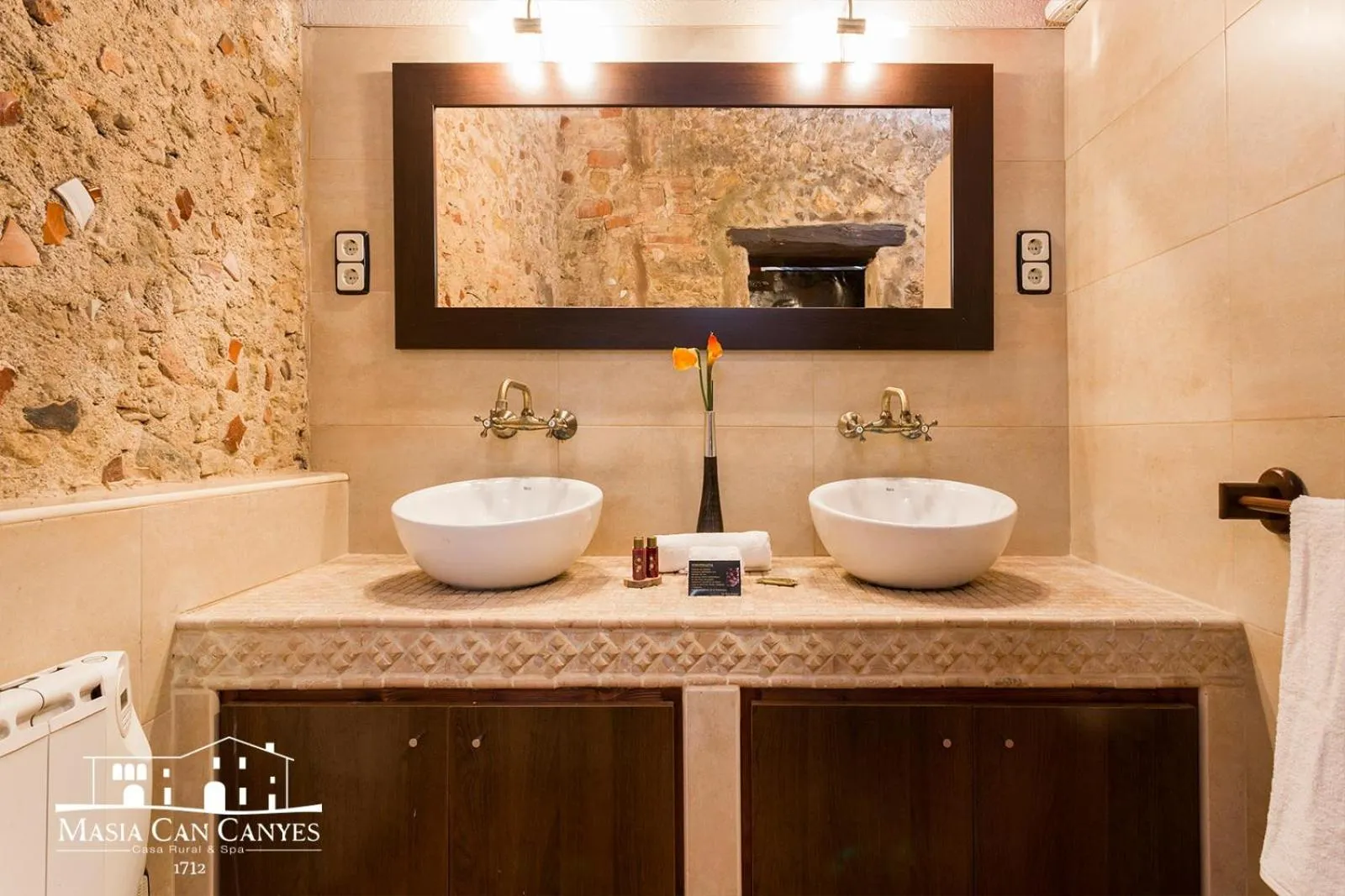 Bathroom in Masia Can Canyes & Spa