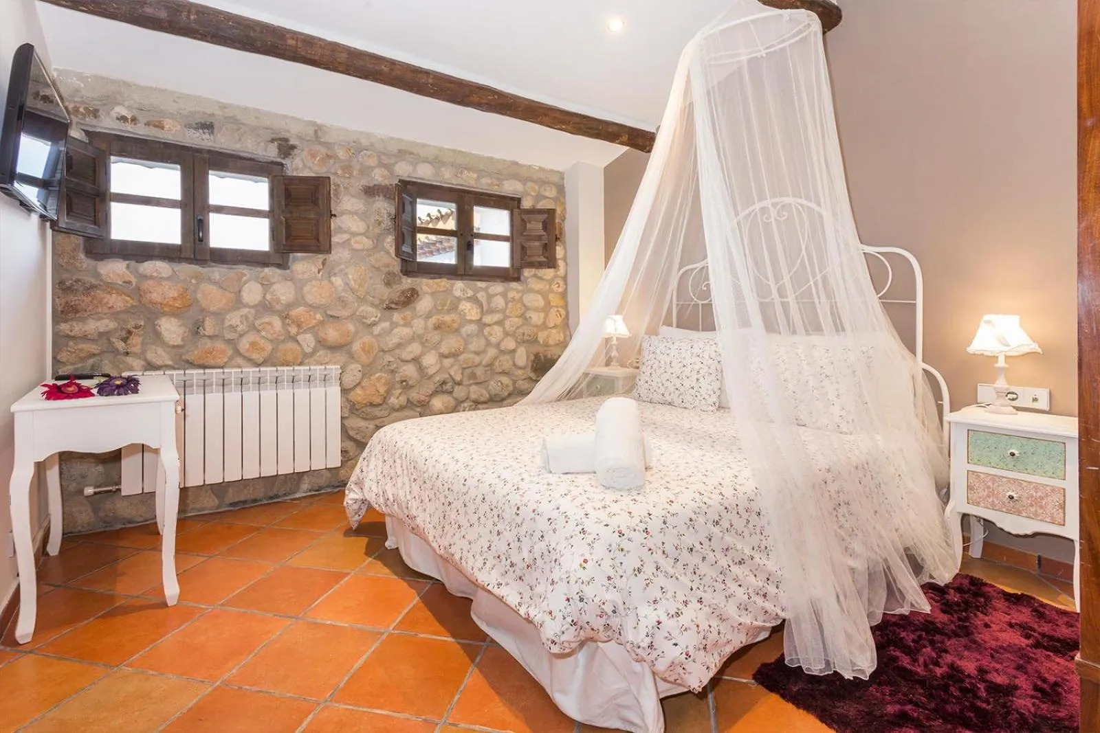 Bed in Masia Can Canyes & Spa