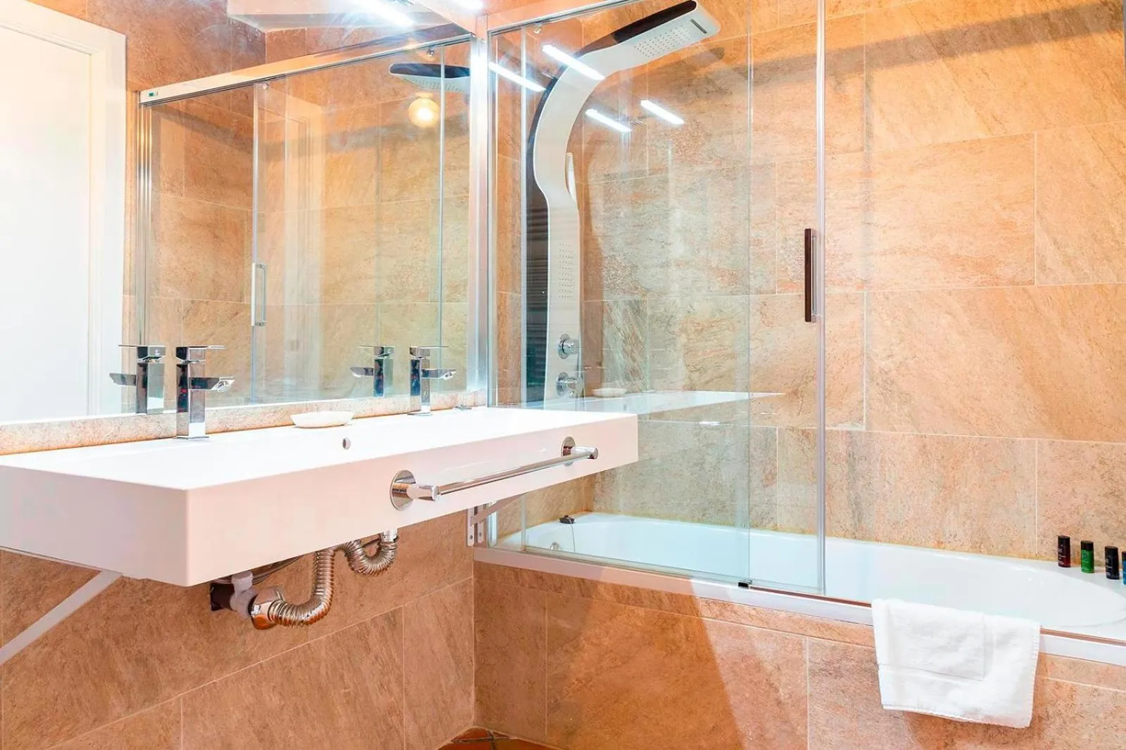 Bathroom in Masia Can Canyes & Spa