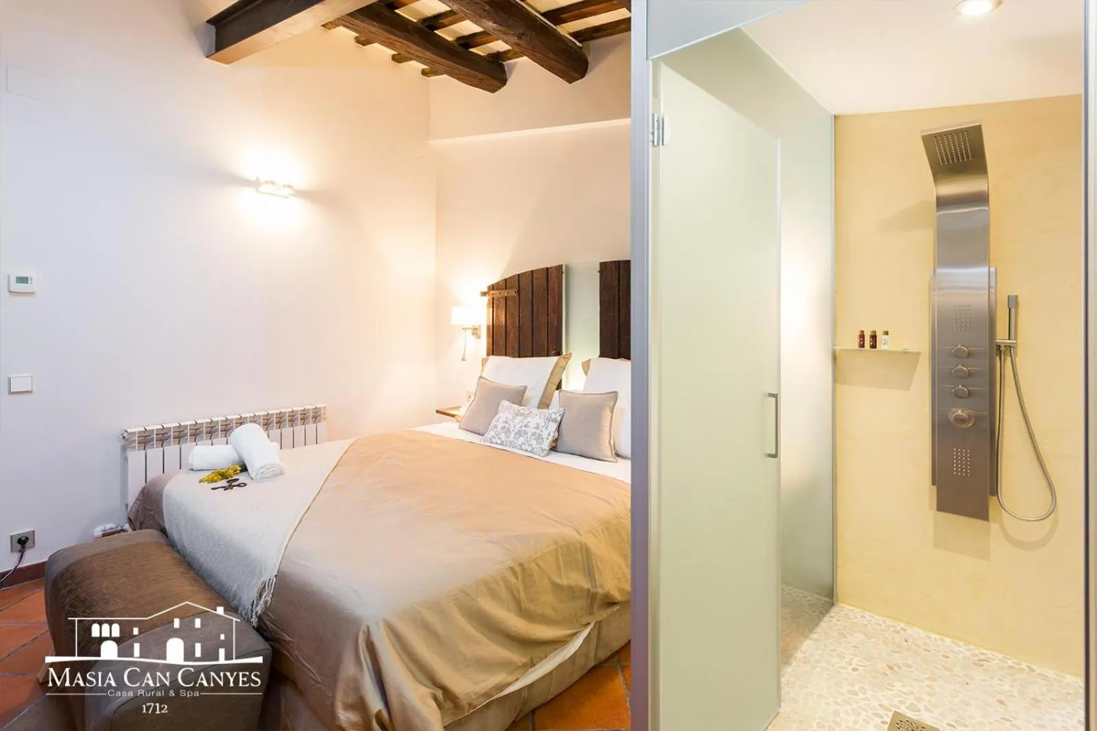 Bed in Masia Can Canyes & Spa