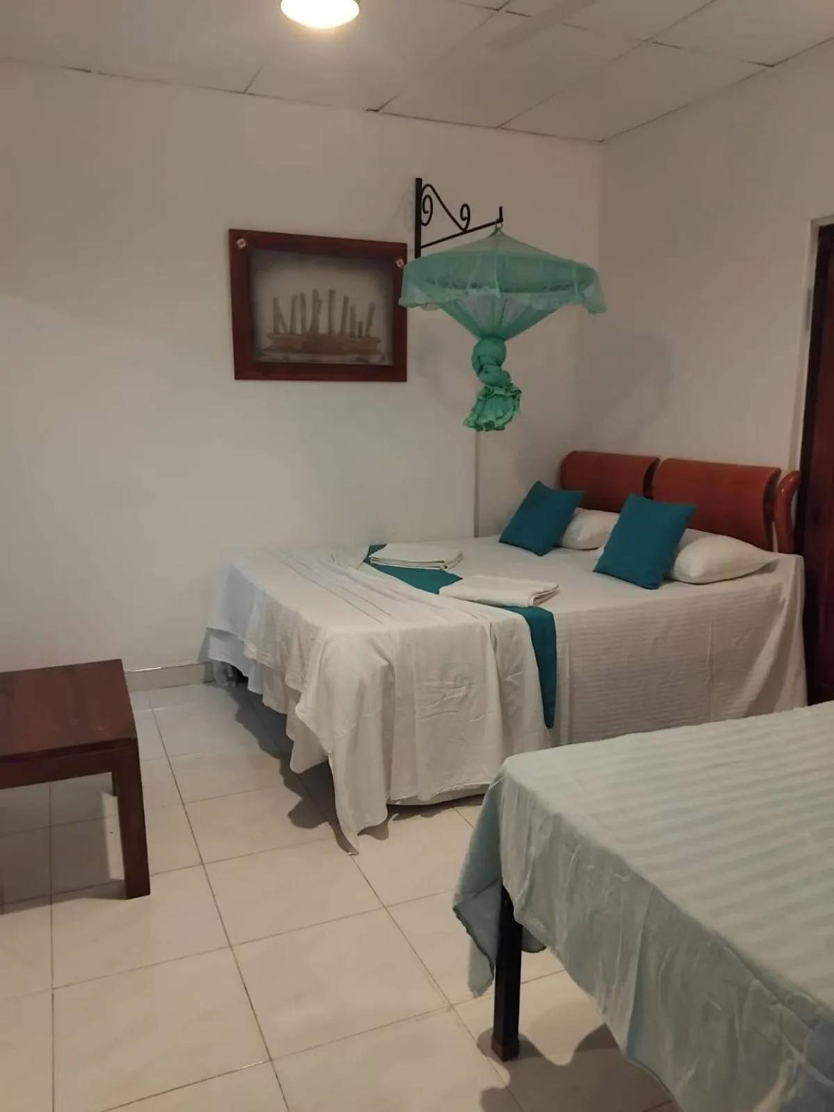 Bed in Goalma Family Holiday Resort & Restaurant