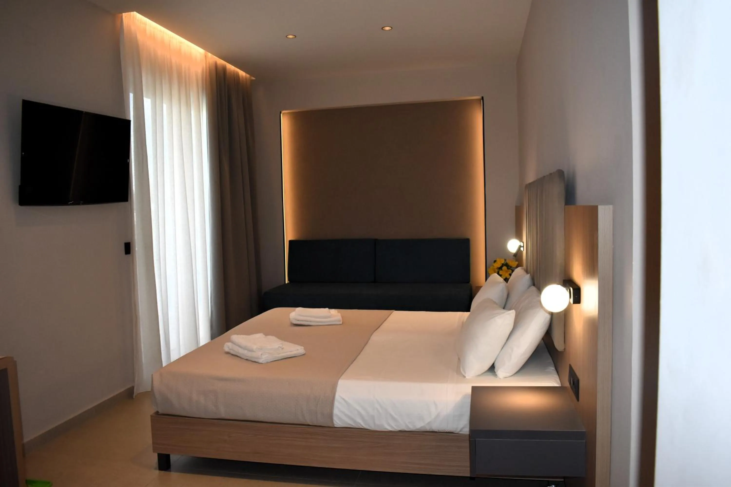 TV and multimedia, Bed in Eden Beach Hotel