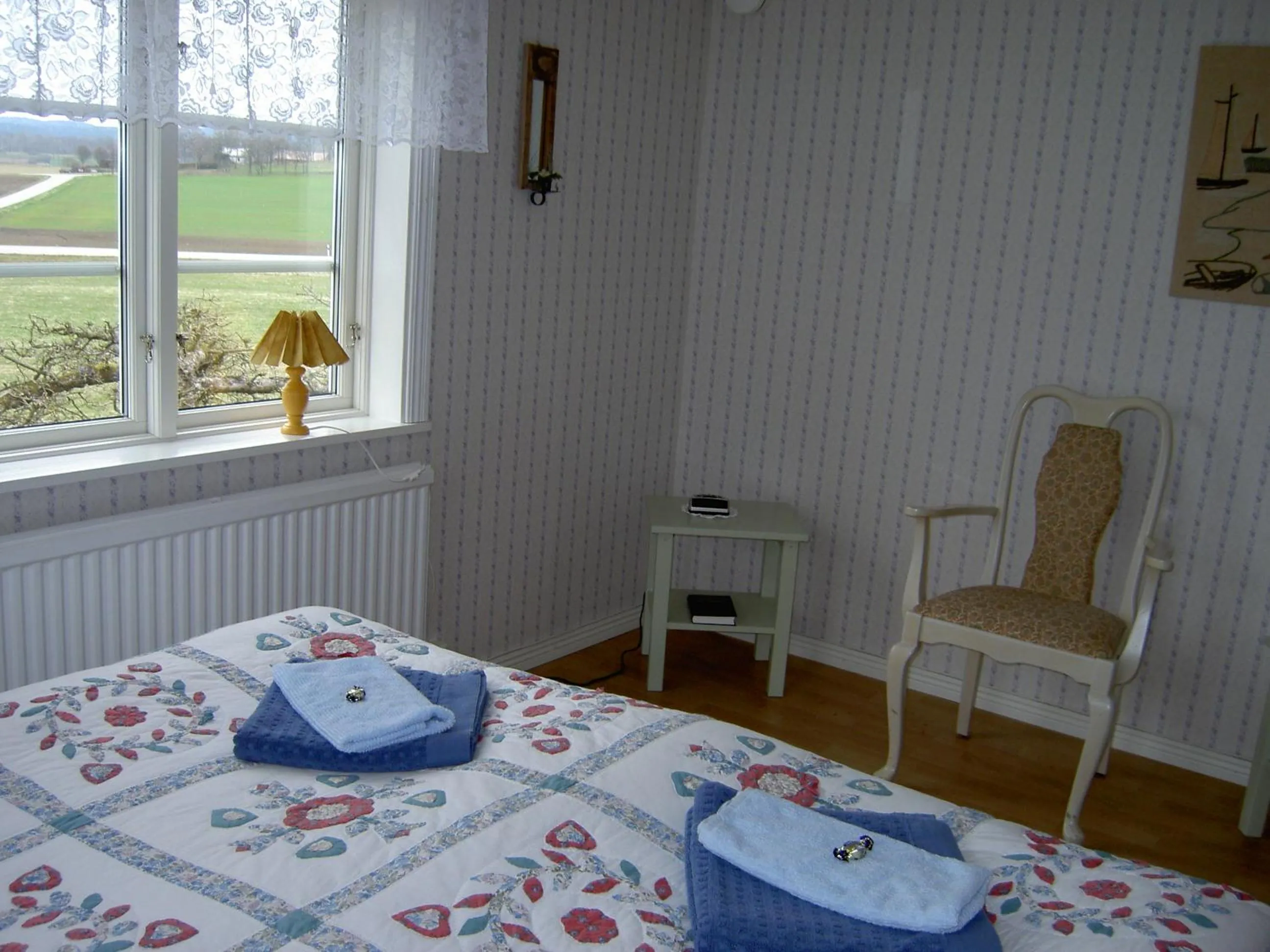 Seating area, Bed in Stakaberg Konferens & Gårdshotell