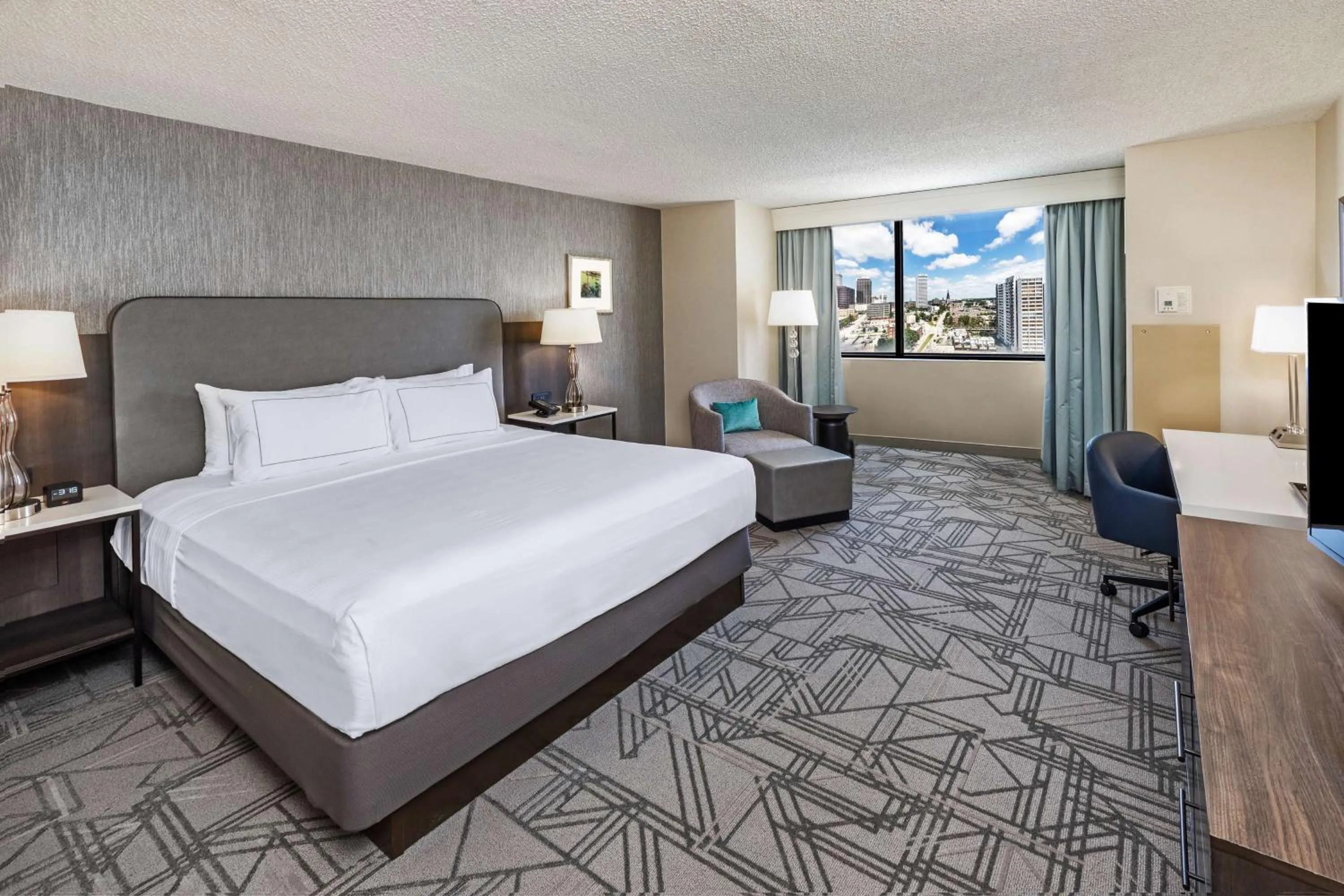 Bed in DoubleTree by Hilton Tulsa Downtown