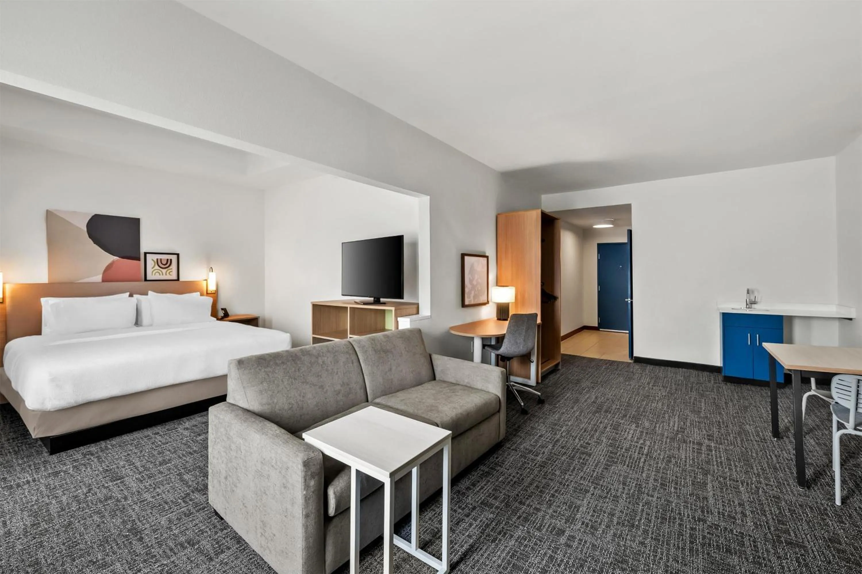 Living room, Bed in Spark by Hilton Spring Lake Fayetteville