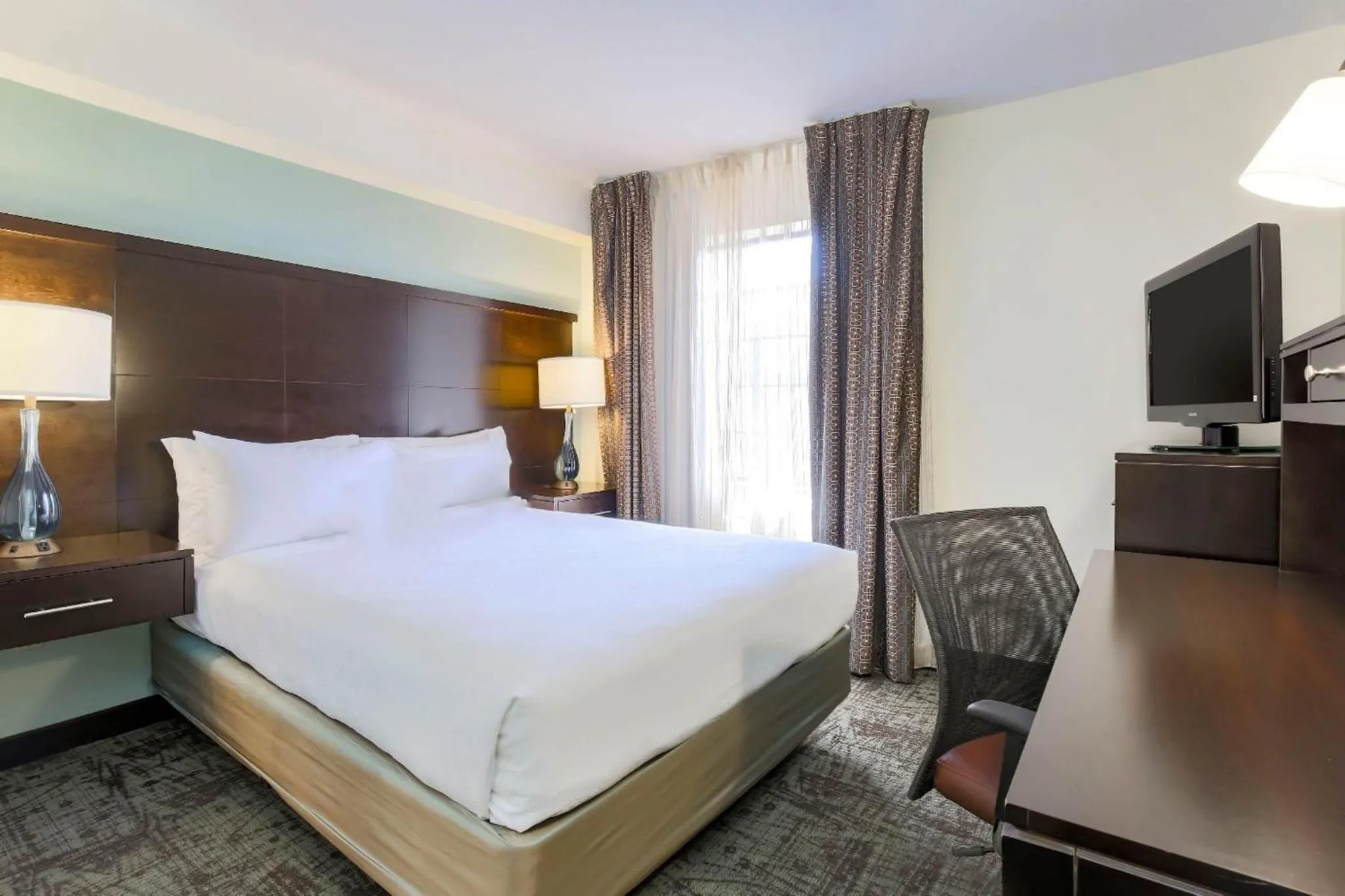 Photo of the whole room, Bed in Staybridge Suites Columbus-Dublin by IHG