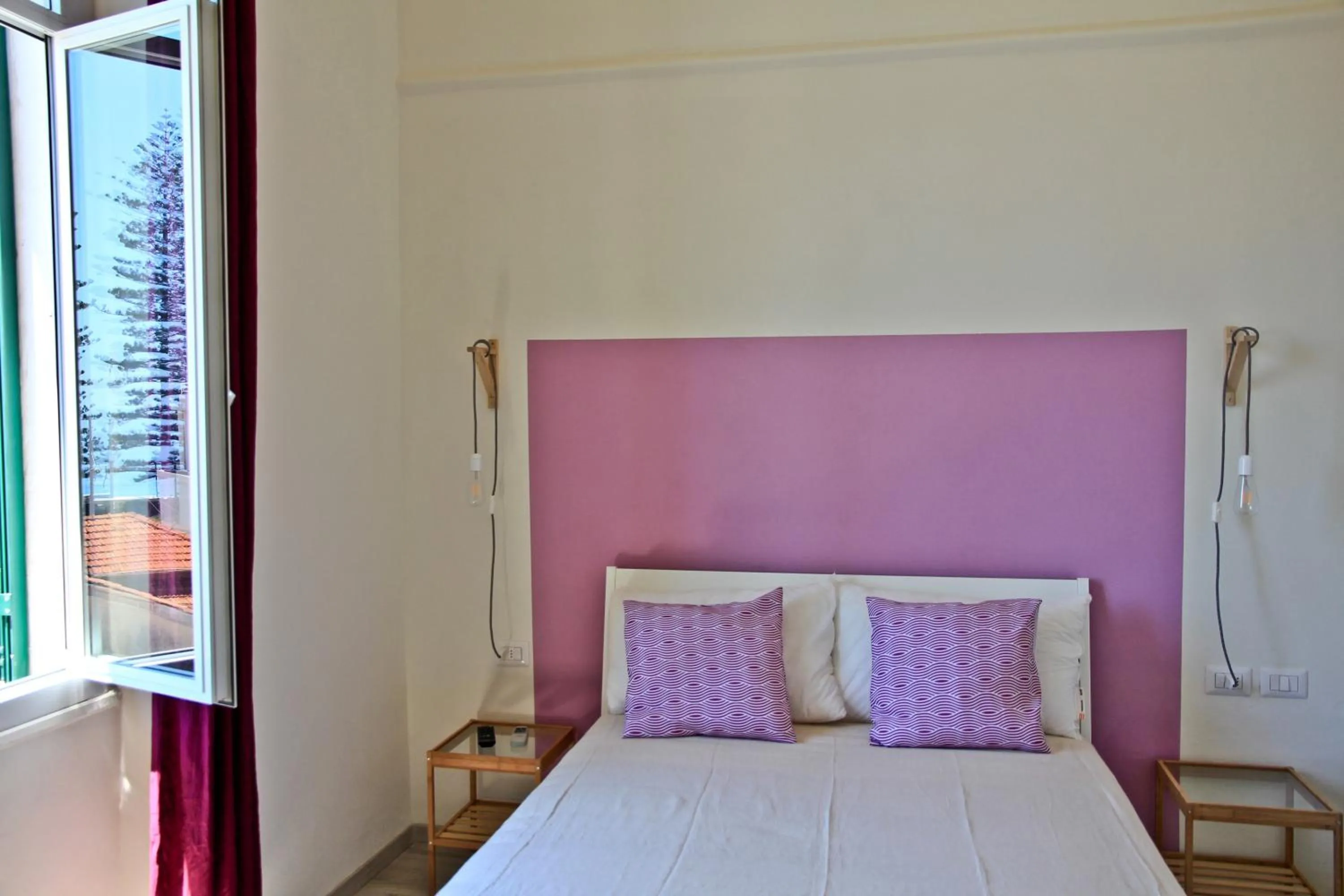 Bed in Hotel Elandra