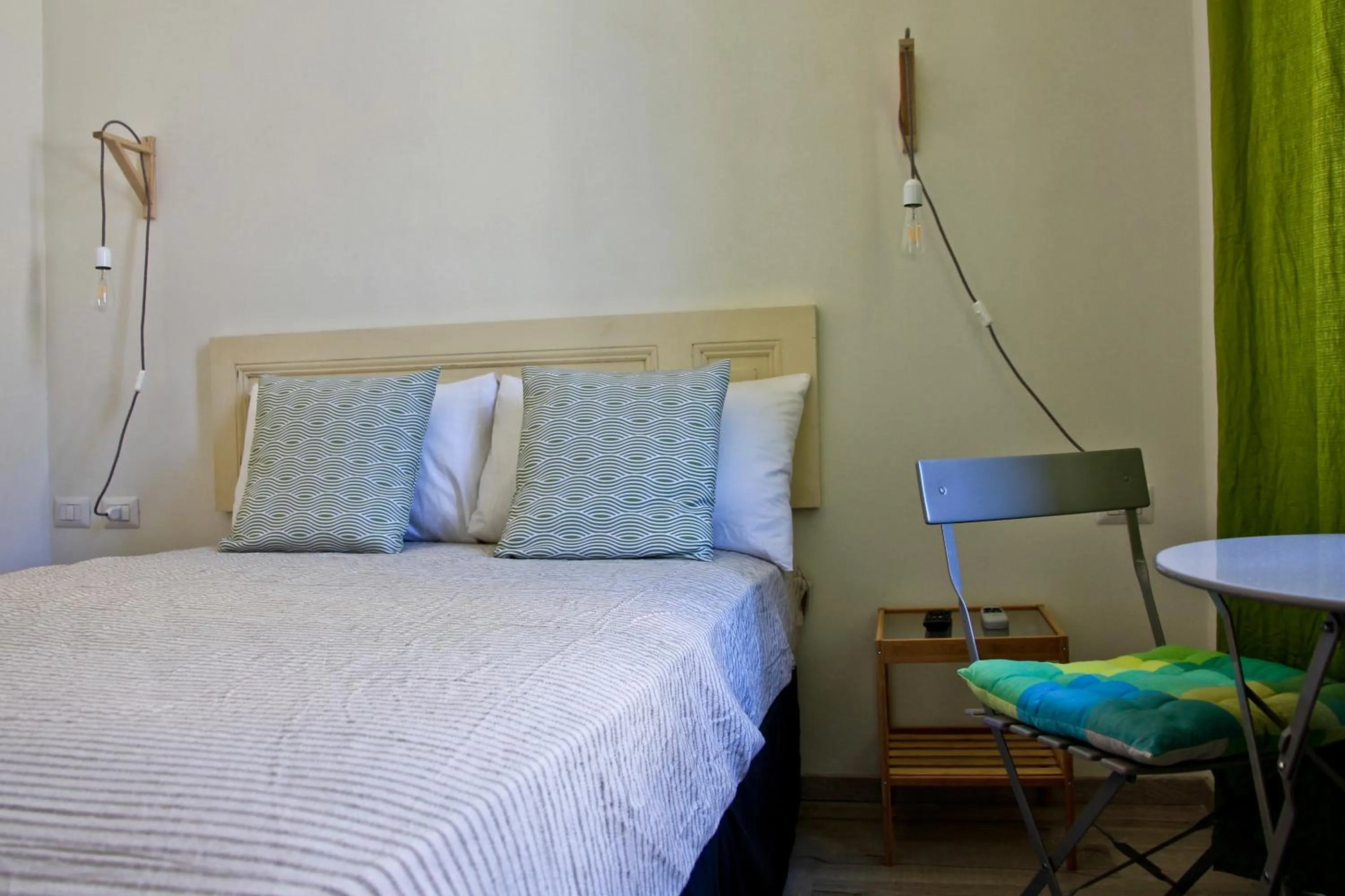 Bed in Hotel Elandra