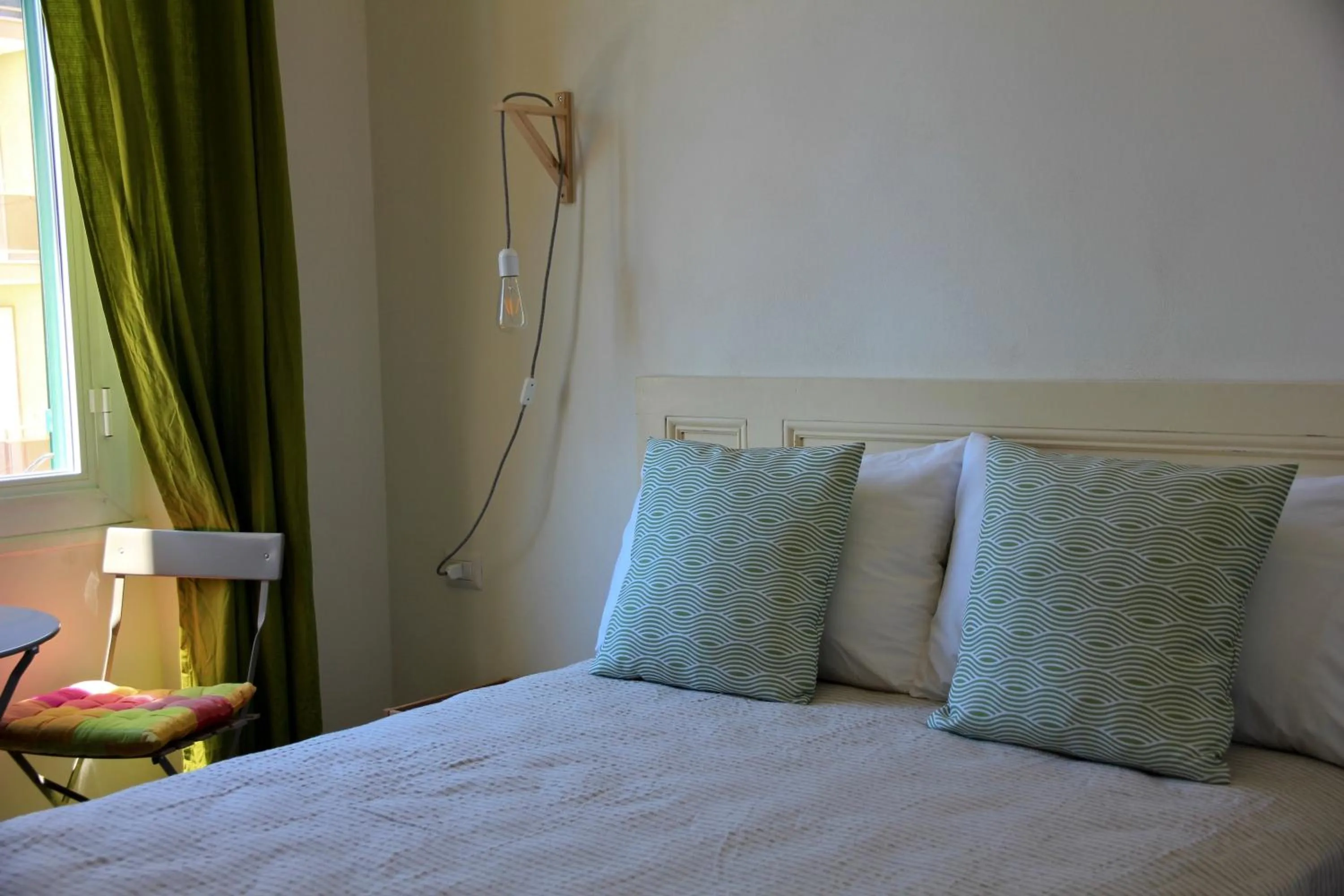 Bed in Hotel Elandra