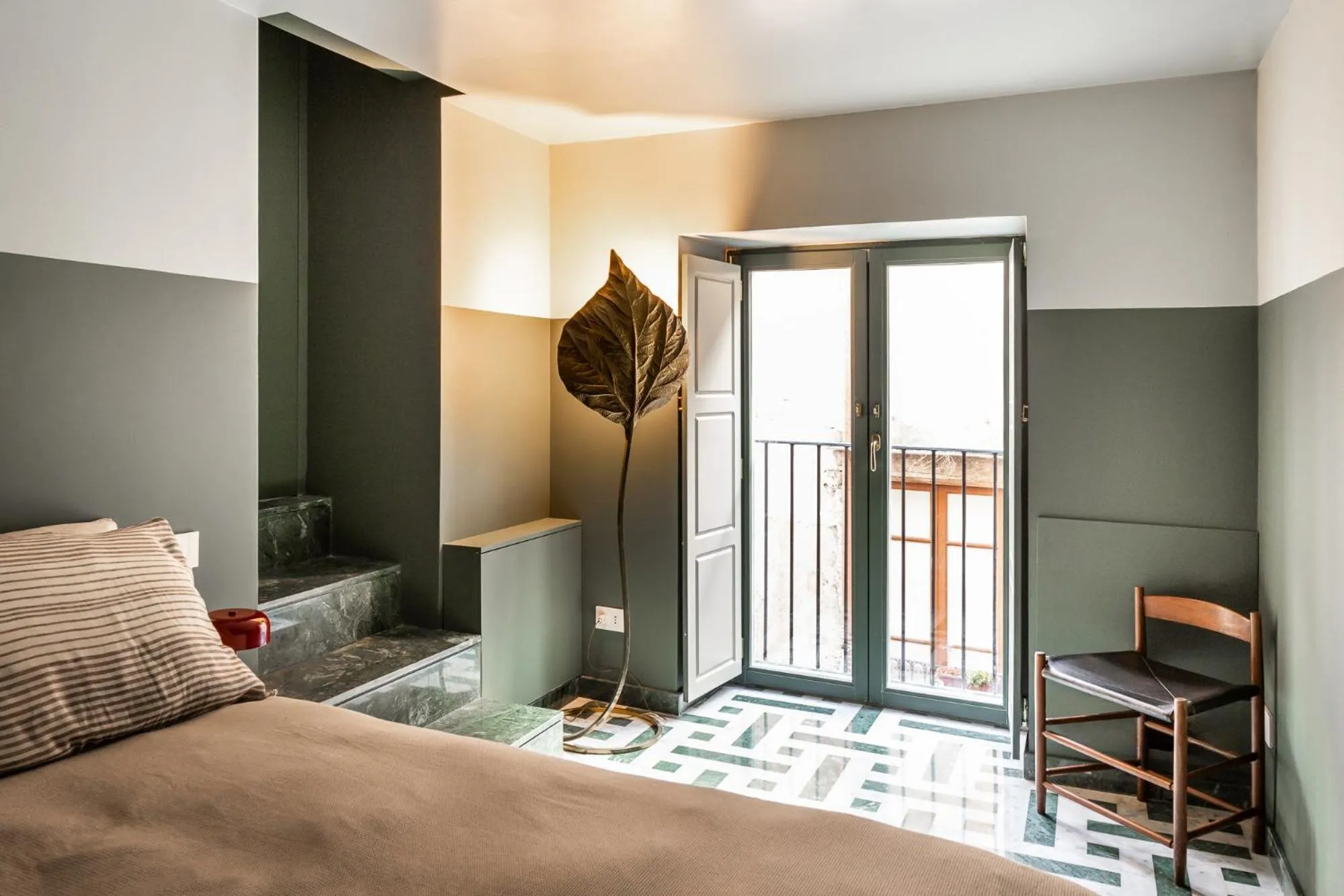 Bed in Le Stanze al Genio di Darlon