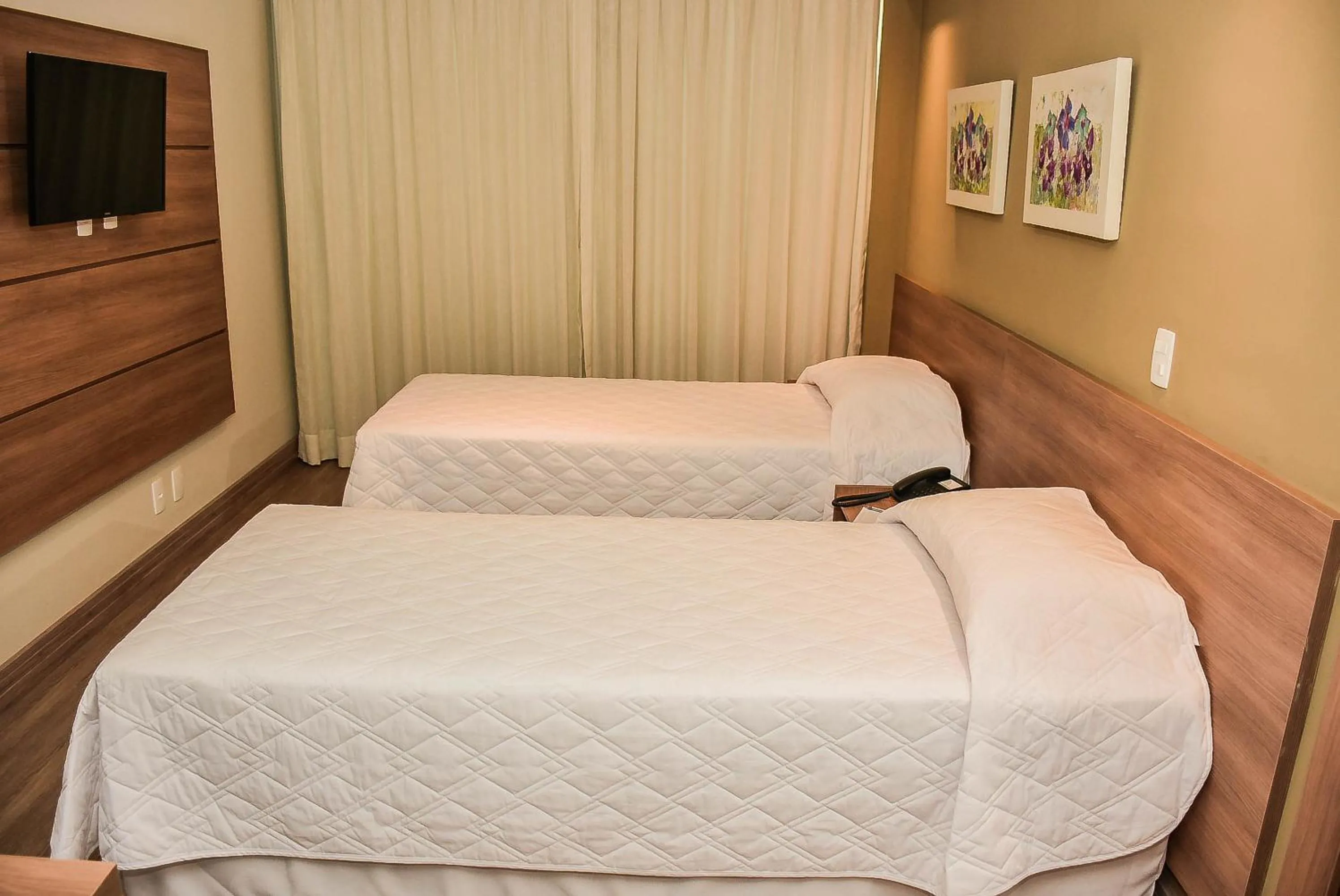 Bed in Mont Blanc Suites Duque de Caxias