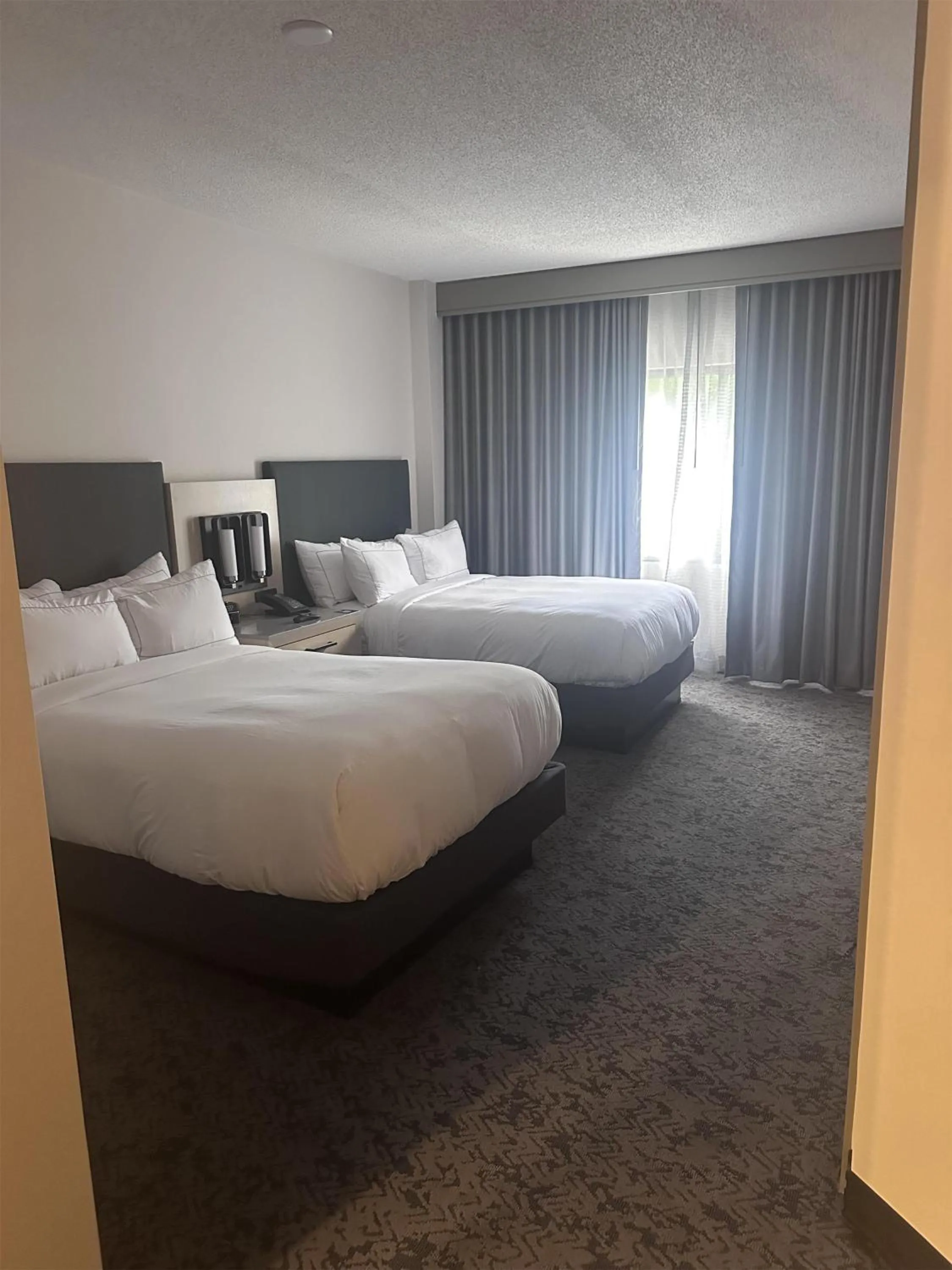 Bed in DoubleTree Suites by Hilton Raleigh-Durham