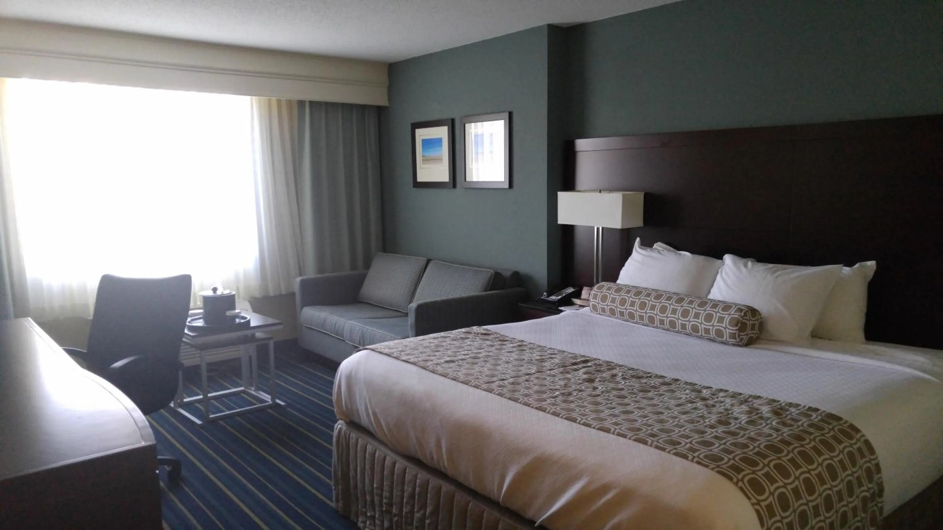 Photo of the whole room, Bed in Crowne Plaza Virginia Beach Town Center by IHG