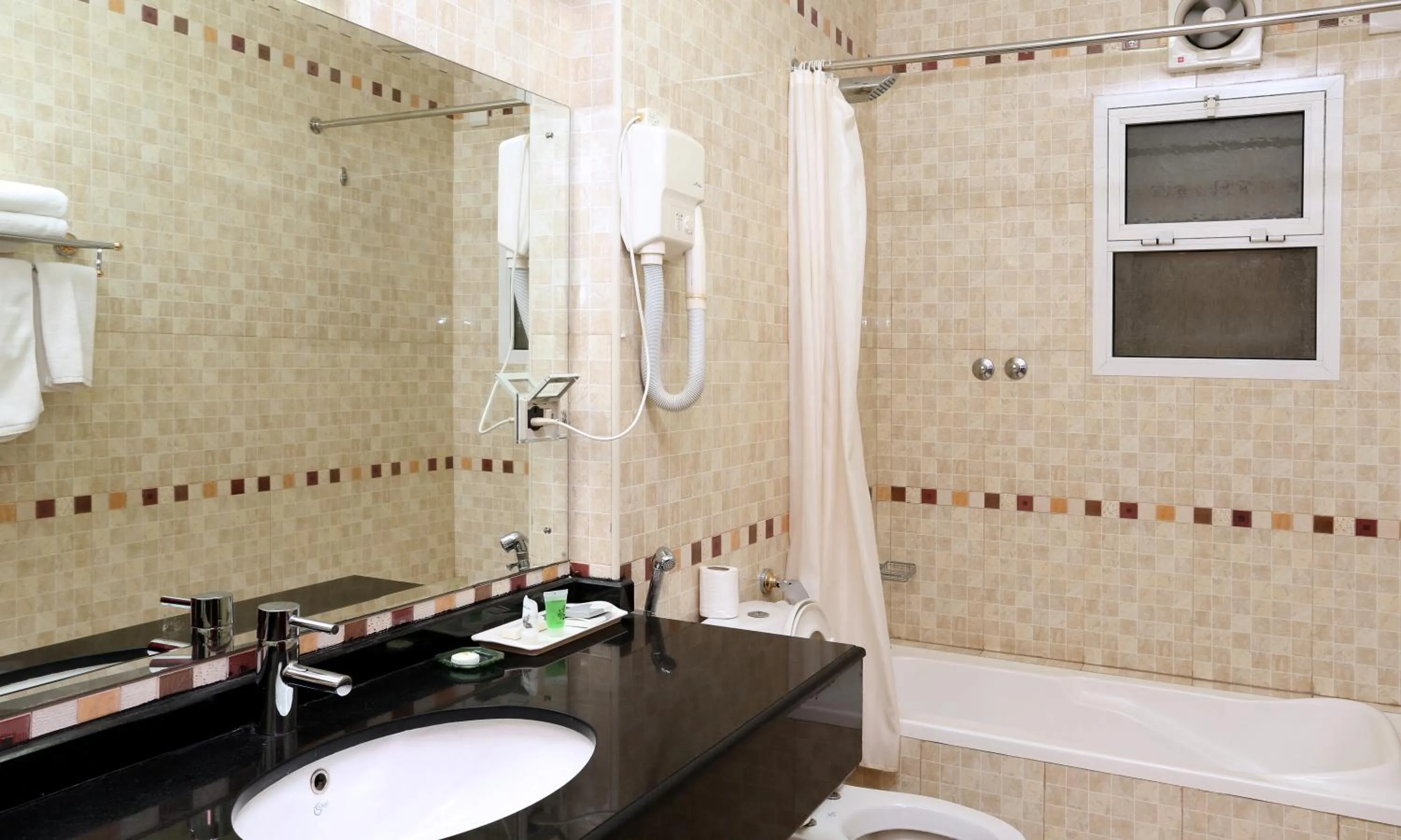 Bathroom in Al Maha Int Hotel Oman