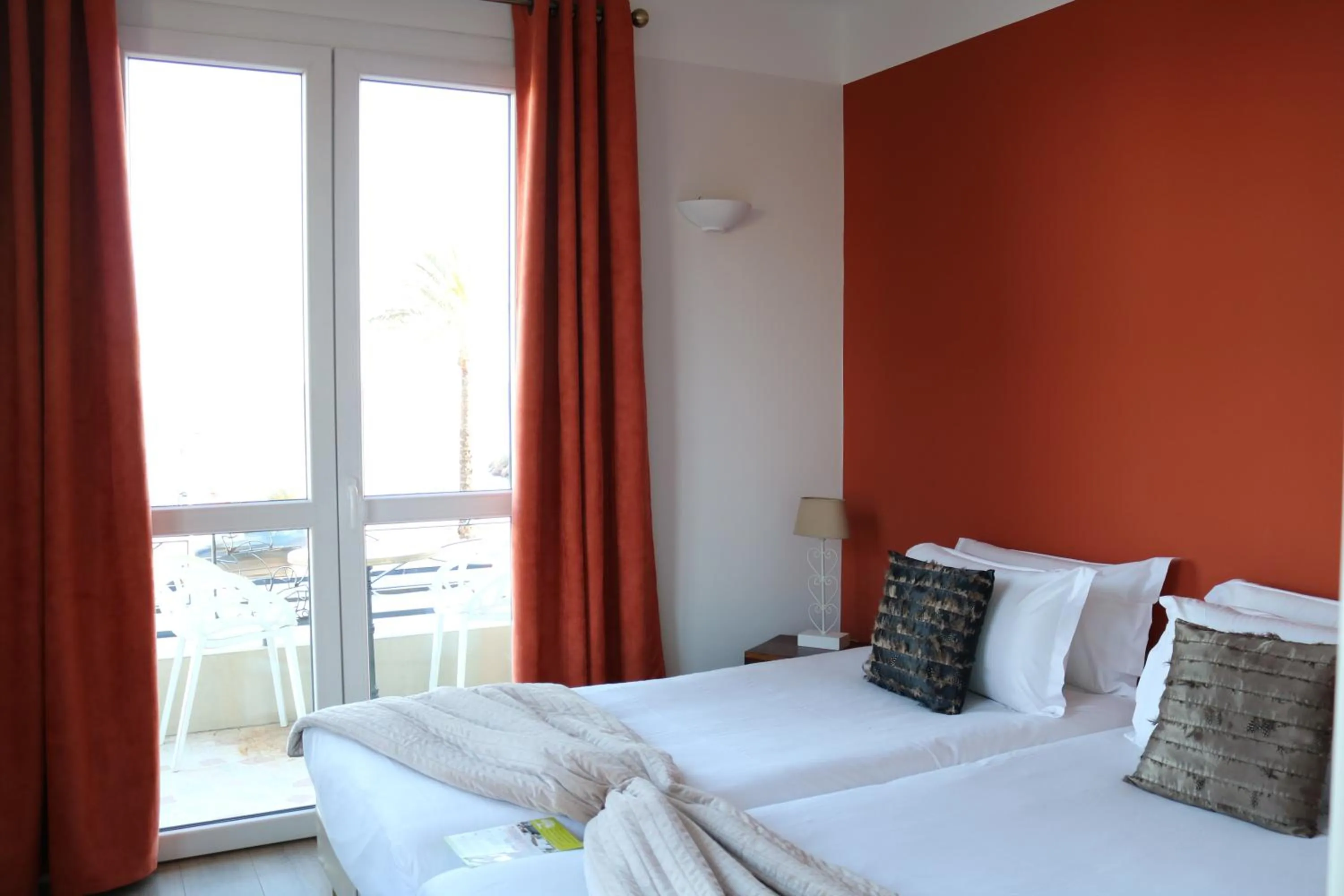 Photo of the whole room, Bed in Hôtel du Bord de Mer "Le Vanillé"