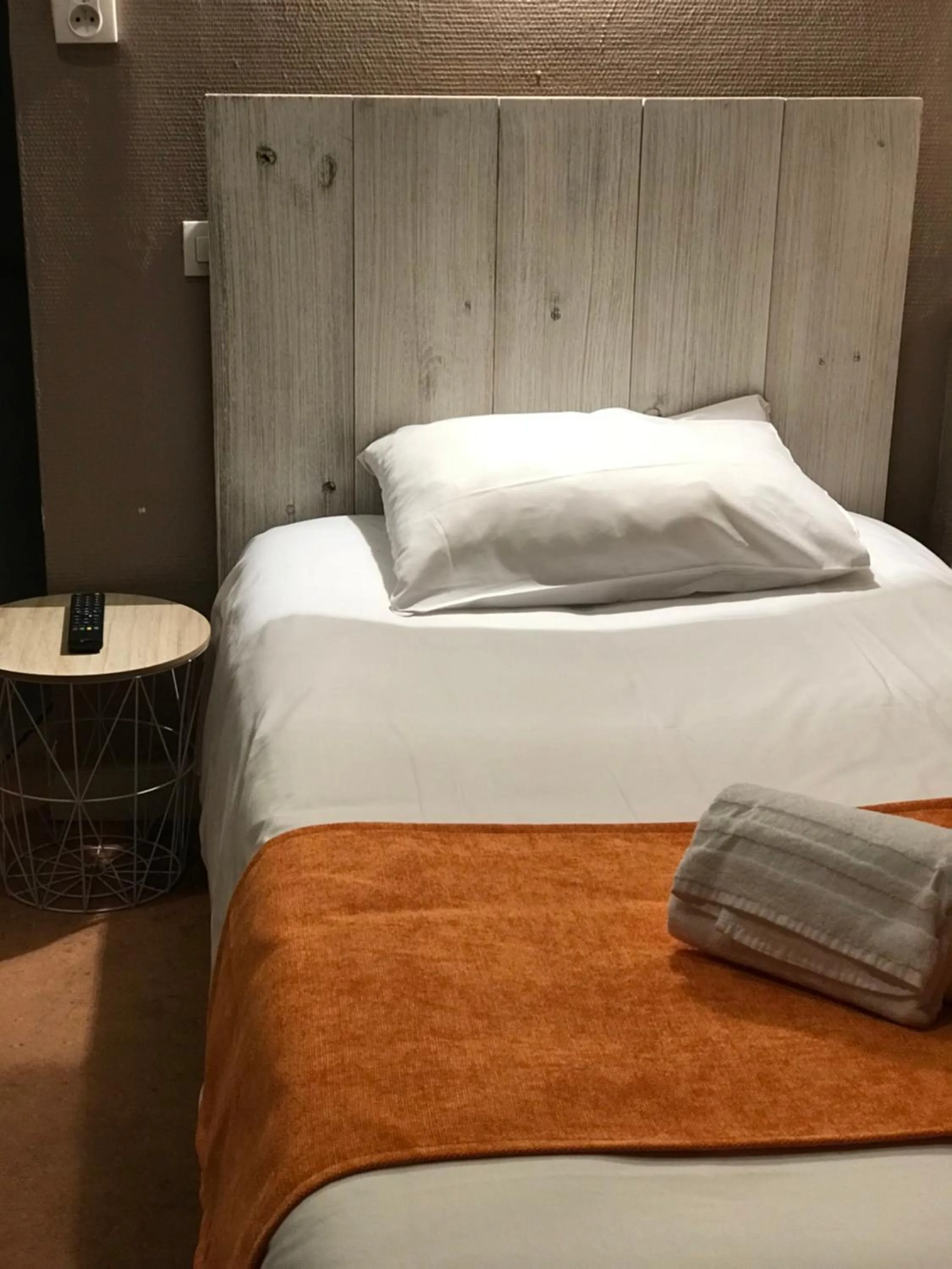 Decorative detail, Bed in Hotel de Bretagne