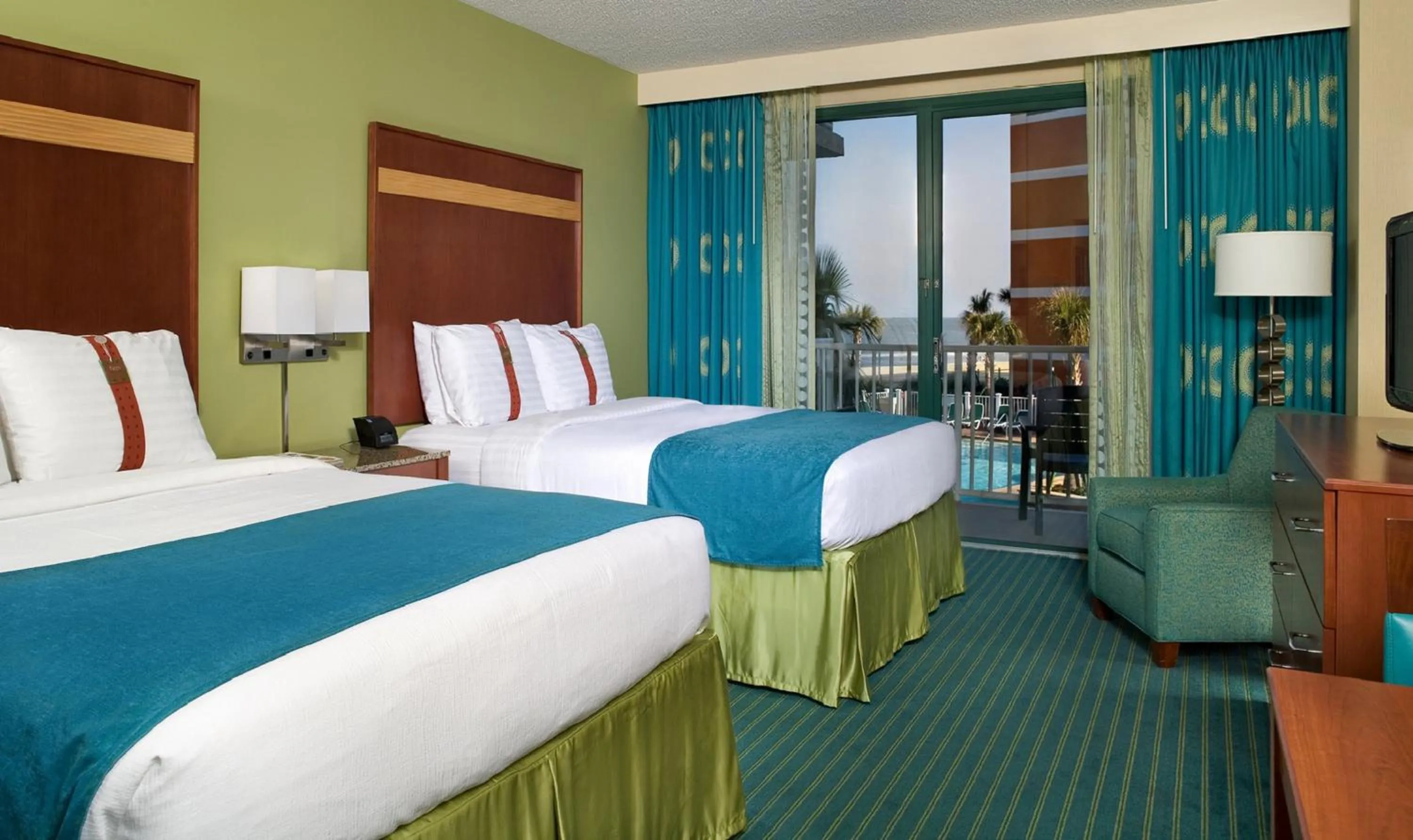 Photo of the whole room, Bed in Holiday Inn & Suites Virginia Beach - North Beach by IHG