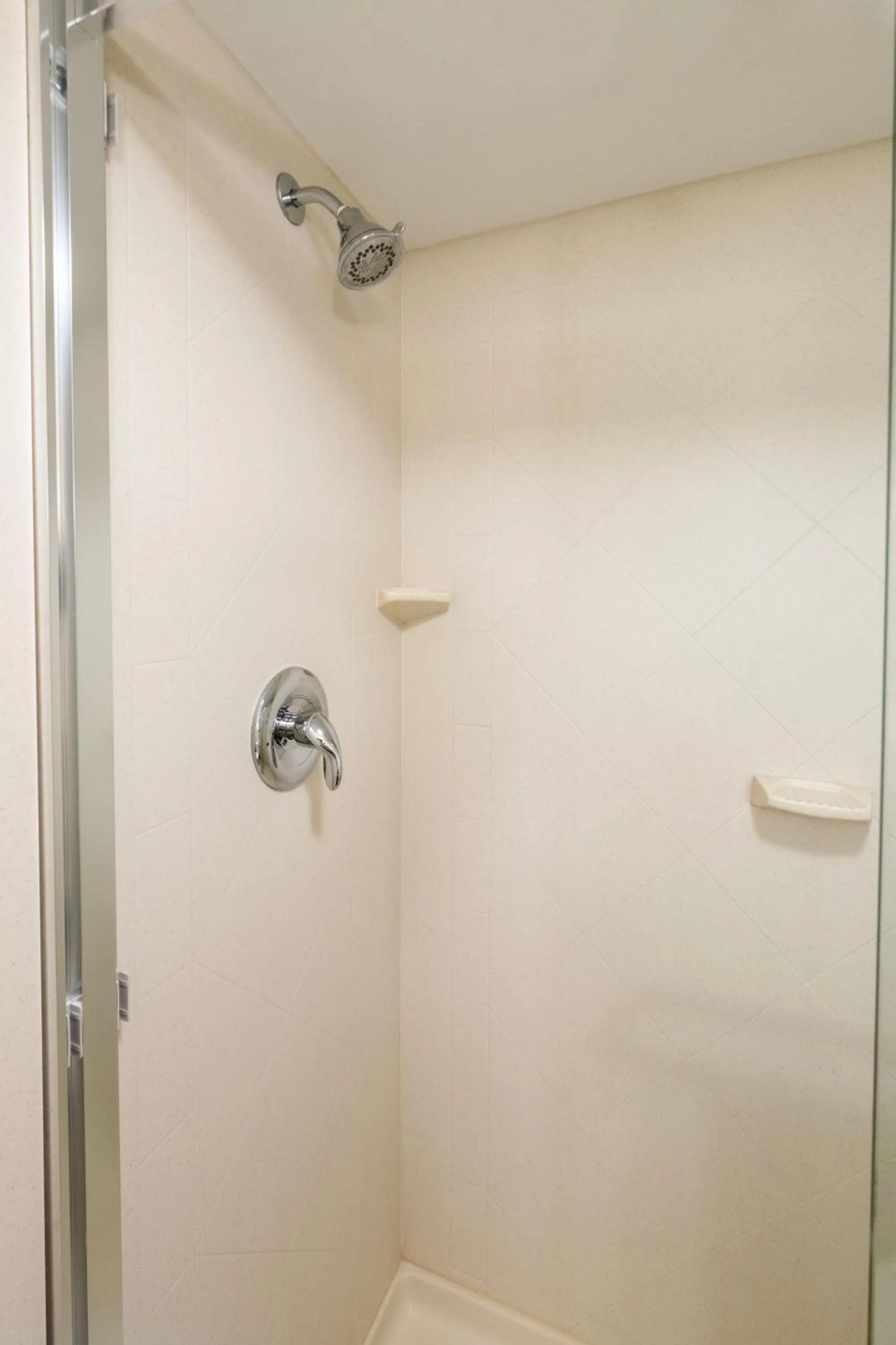 Shower in Holiday Inn & Suites Virginia Beach - North Beach by IHG