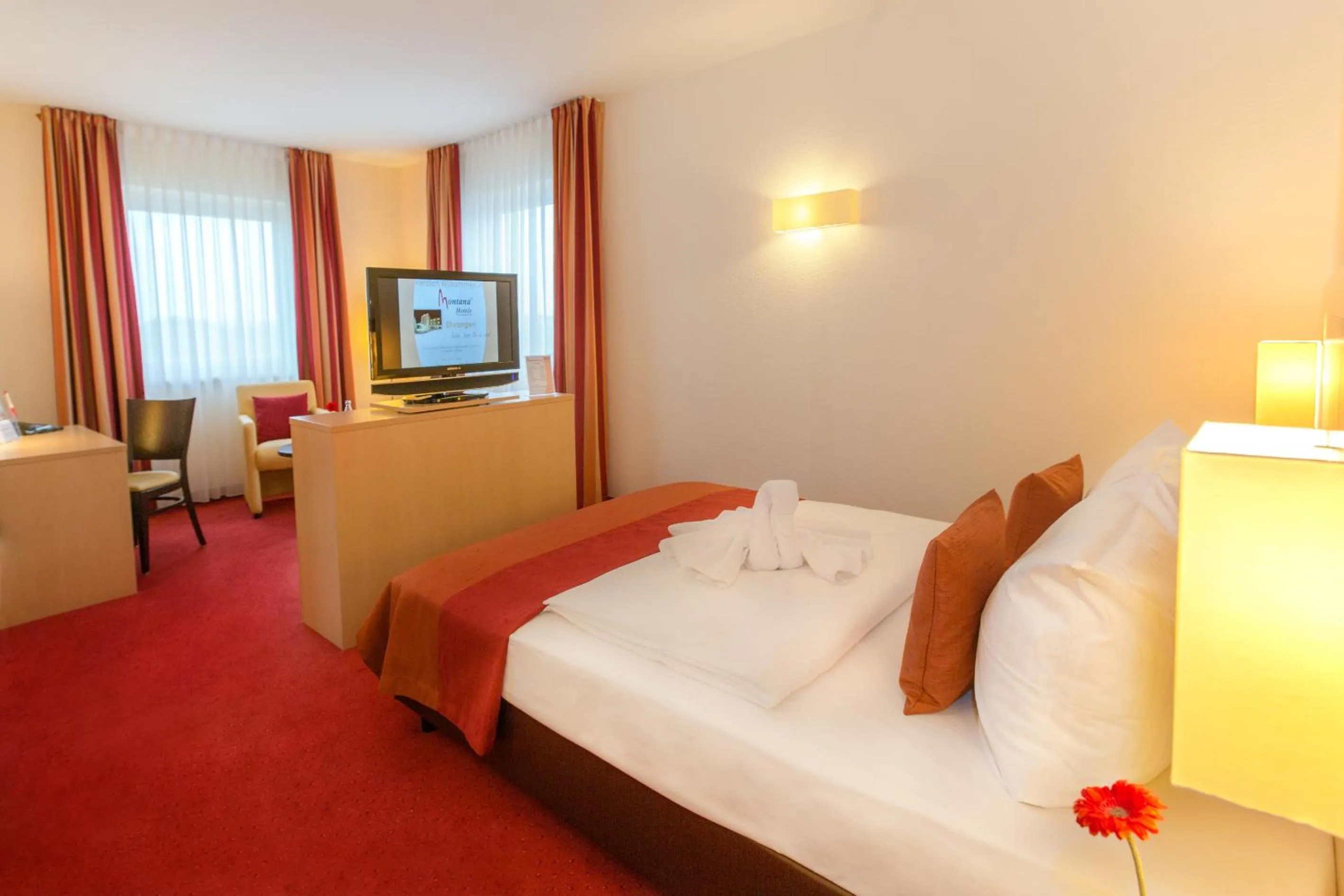 Photo of the whole room, Bed in Montana-Hotel Ellwangen