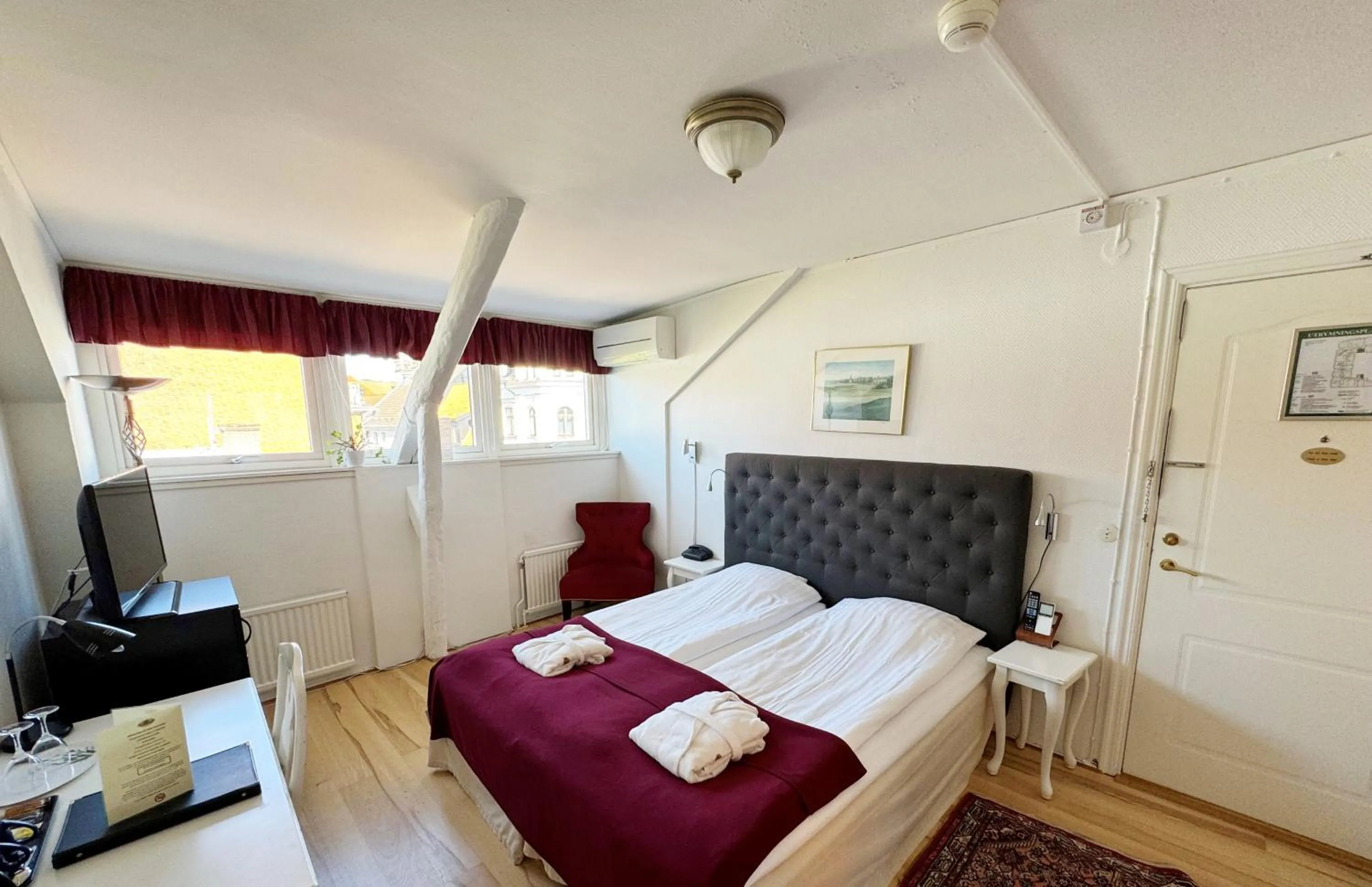 Bed in Hotel Concordia