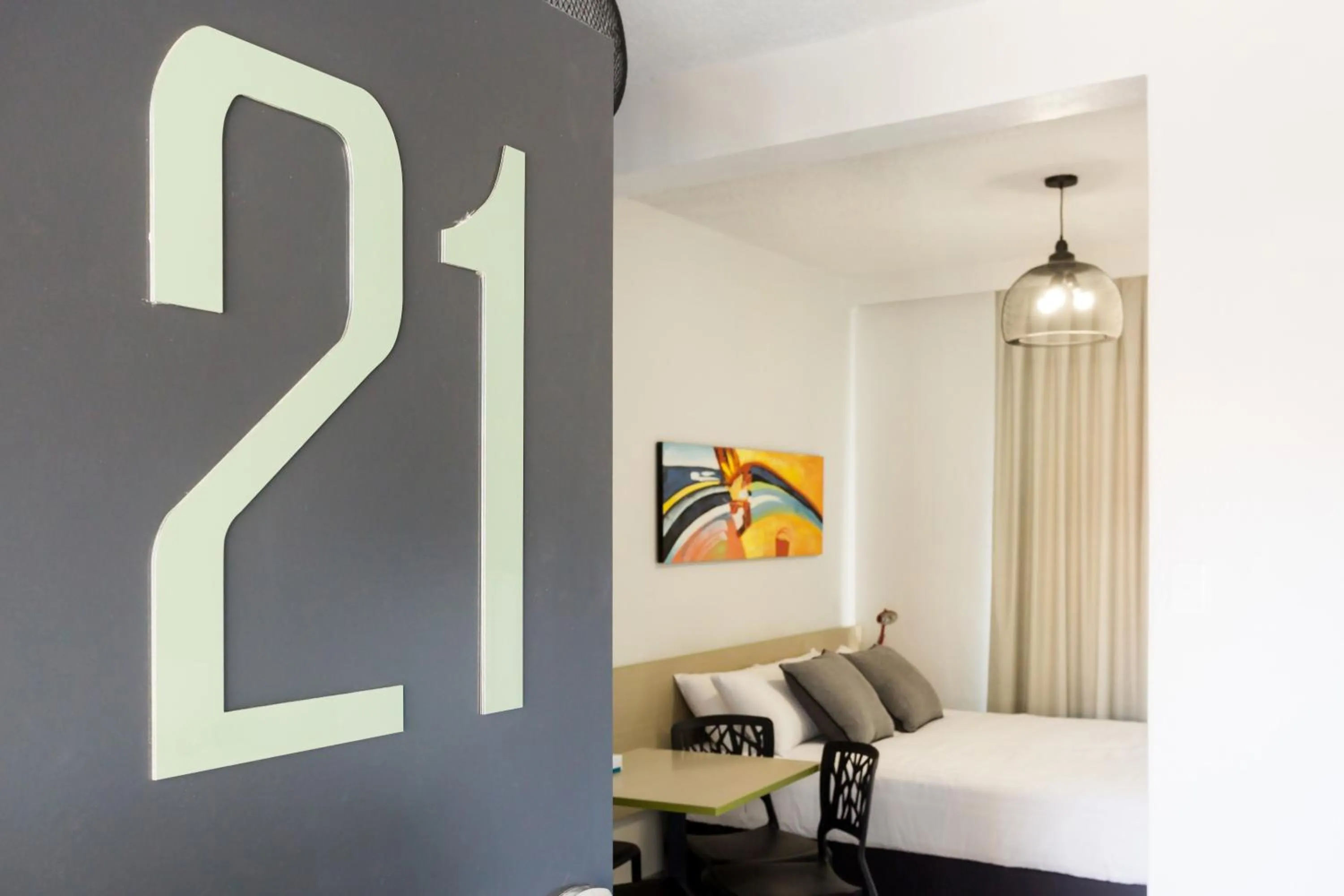 Photo of the whole room, Bed in Nightcap at Emerald Star Hotel