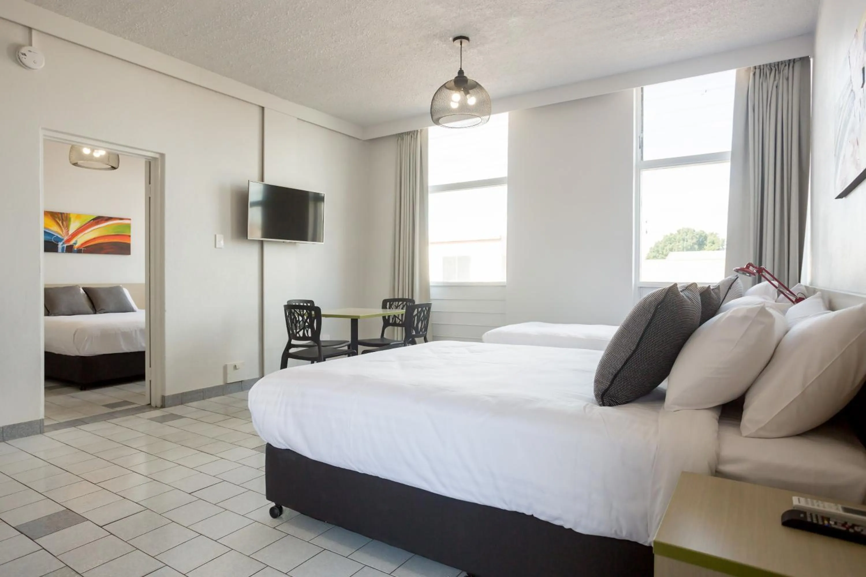 Photo of the whole room, Bed in Nightcap at Emerald Star Hotel