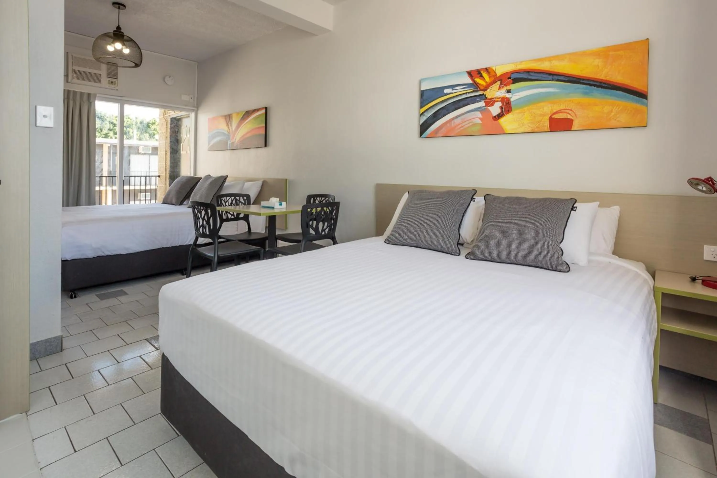 Bedroom, Bed in Nightcap at Emerald Star Hotel