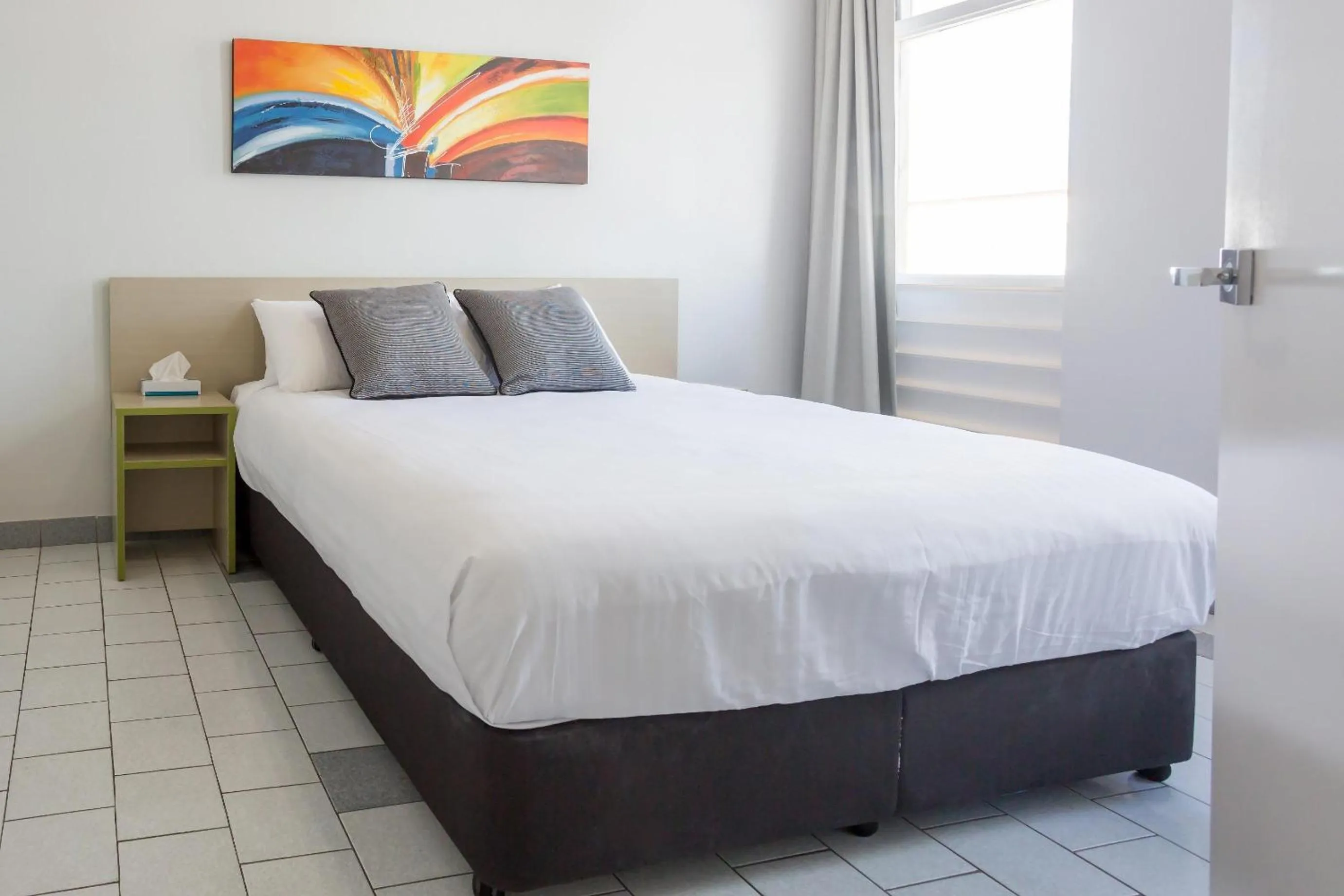 Bedroom, Bed in Nightcap at Emerald Star Hotel