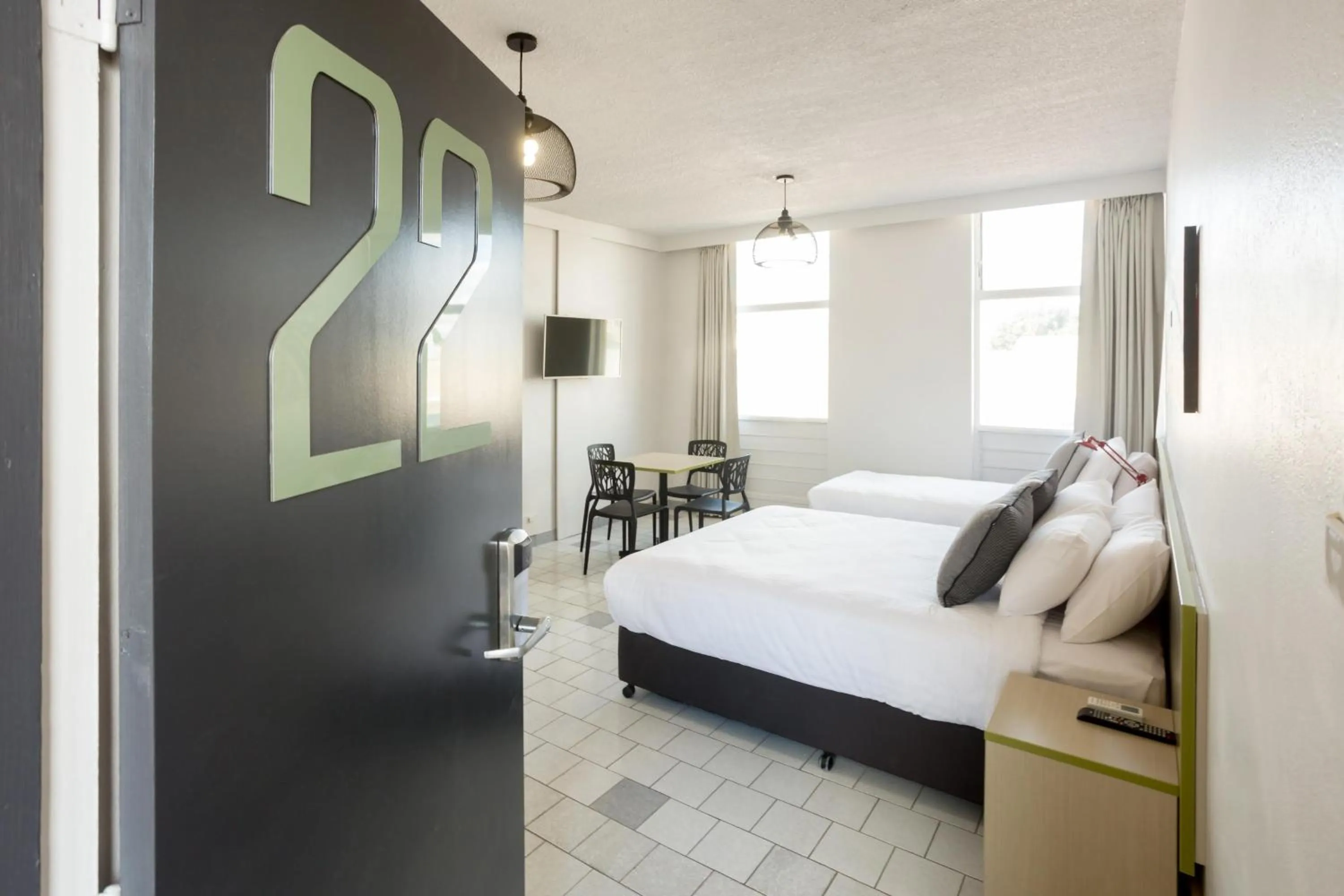 Bedroom, Bed in Nightcap at Emerald Star Hotel