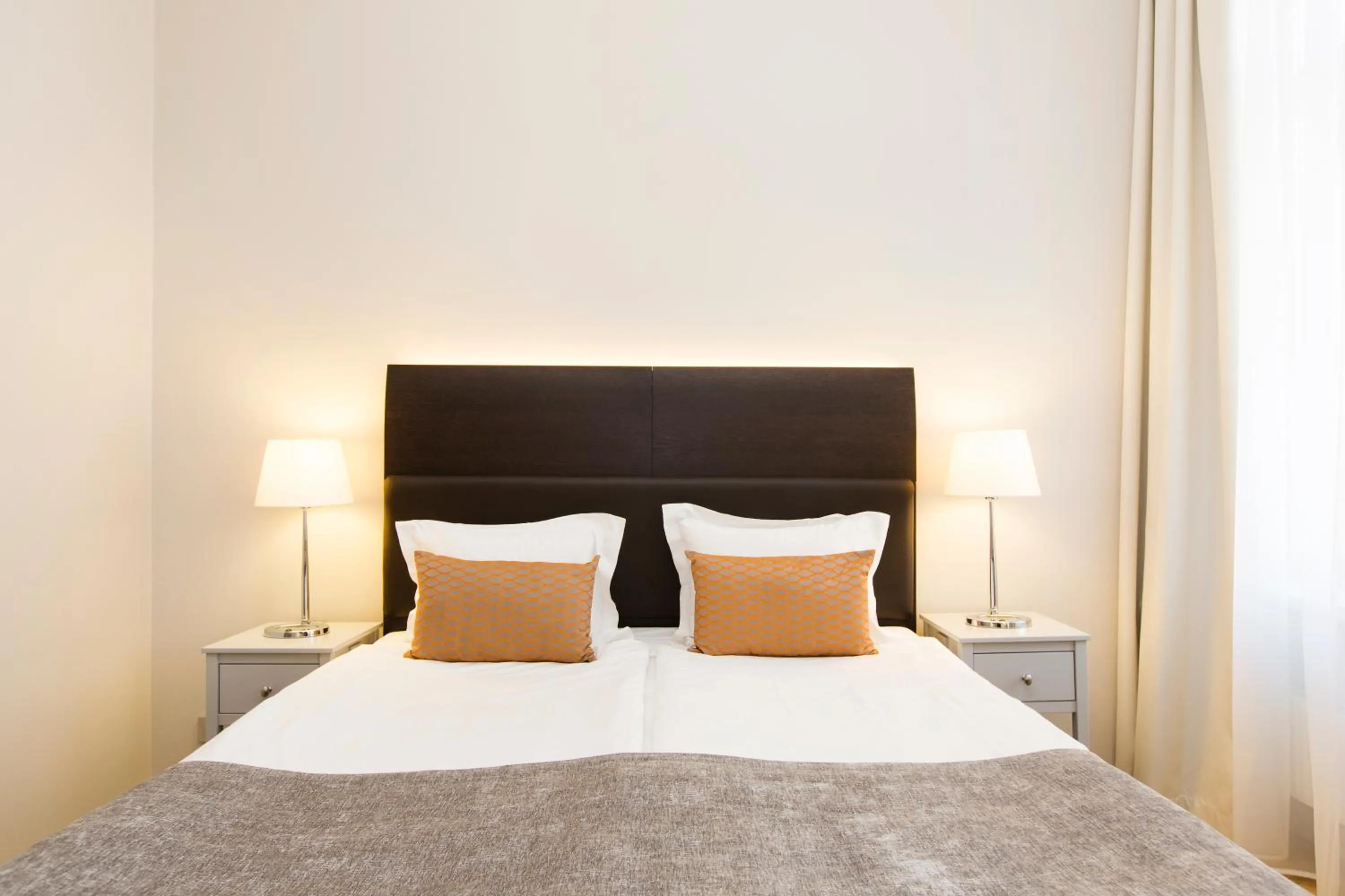 Bed in Elite Hotel Adlon